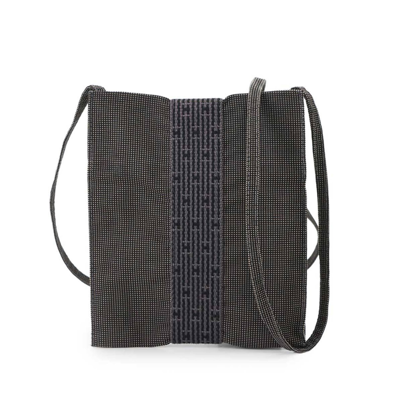 Shoulder Bag Pochette Hermes: Shoulder Bag Pochette Hermes Gray canvas pochette from Hermes, measuring 19cm x 16.5cm x 1.5cm, in mint condition with like-new features. This shoulder bag boasts a classic design and premium