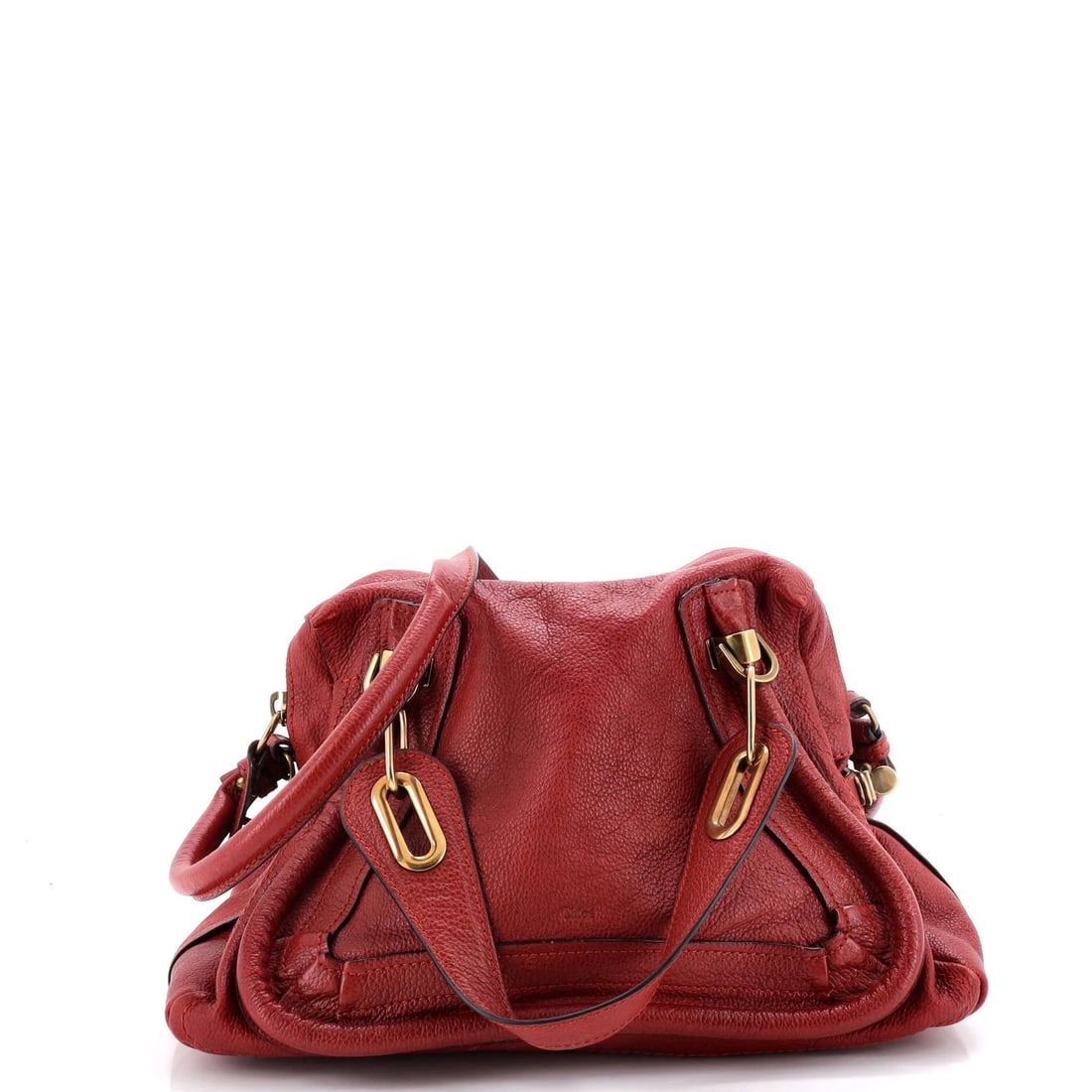 Leather bag medium top handle paraty chloe: Leather bag medium top handle paraty chloe Red leather medium top handle Paraty bag from Chloe, featuring a classic satchel design with aged gold hardware. The bag shows signs of wear and tear,