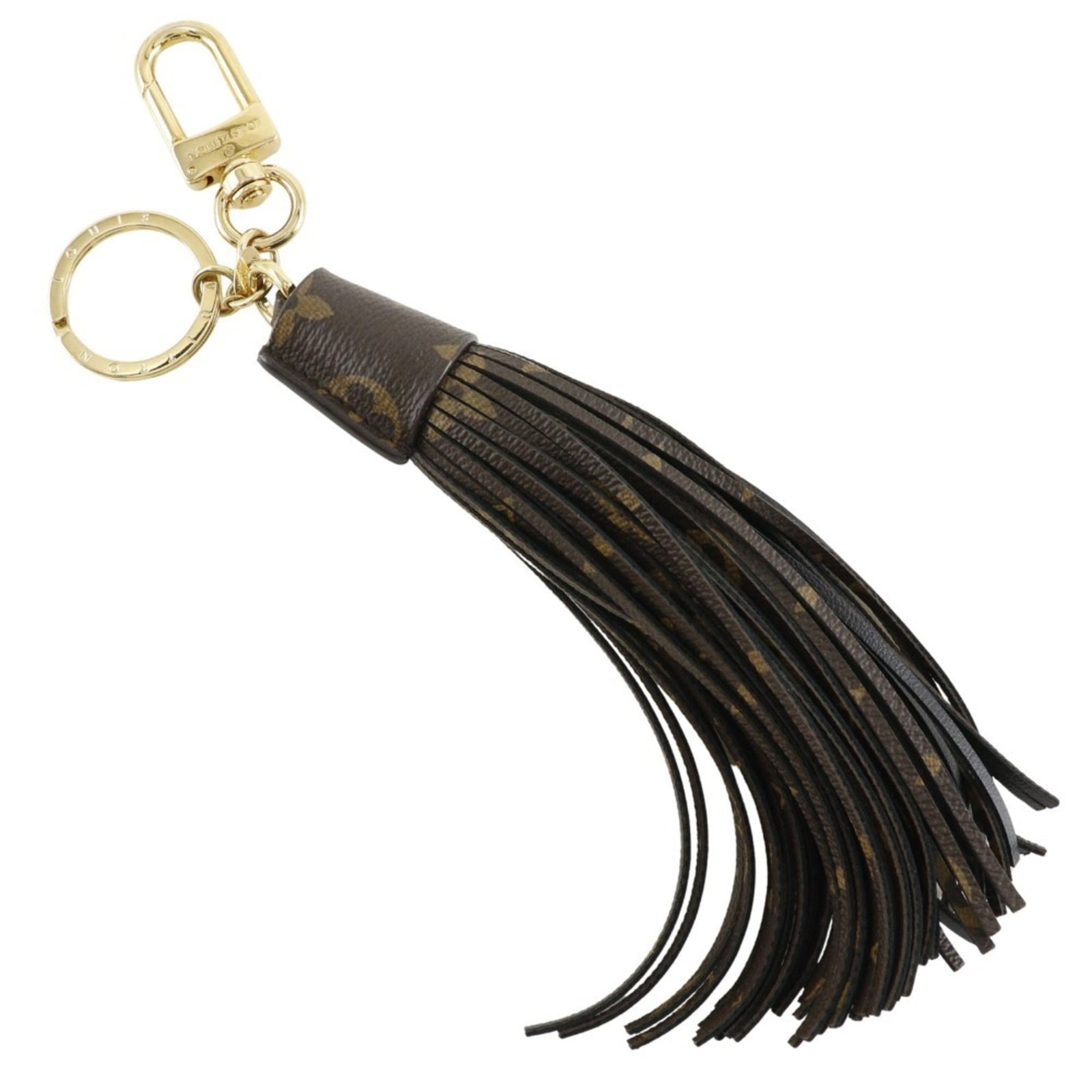 Monogram Keyring Louis Vuitton: Monogram Keyring Louis Vuitton Monogrammed with the iconic Louis Vuitton design, this brown keyring features the signature monogram pattern. Traces of usage are evident, with minor scratches and dirt 