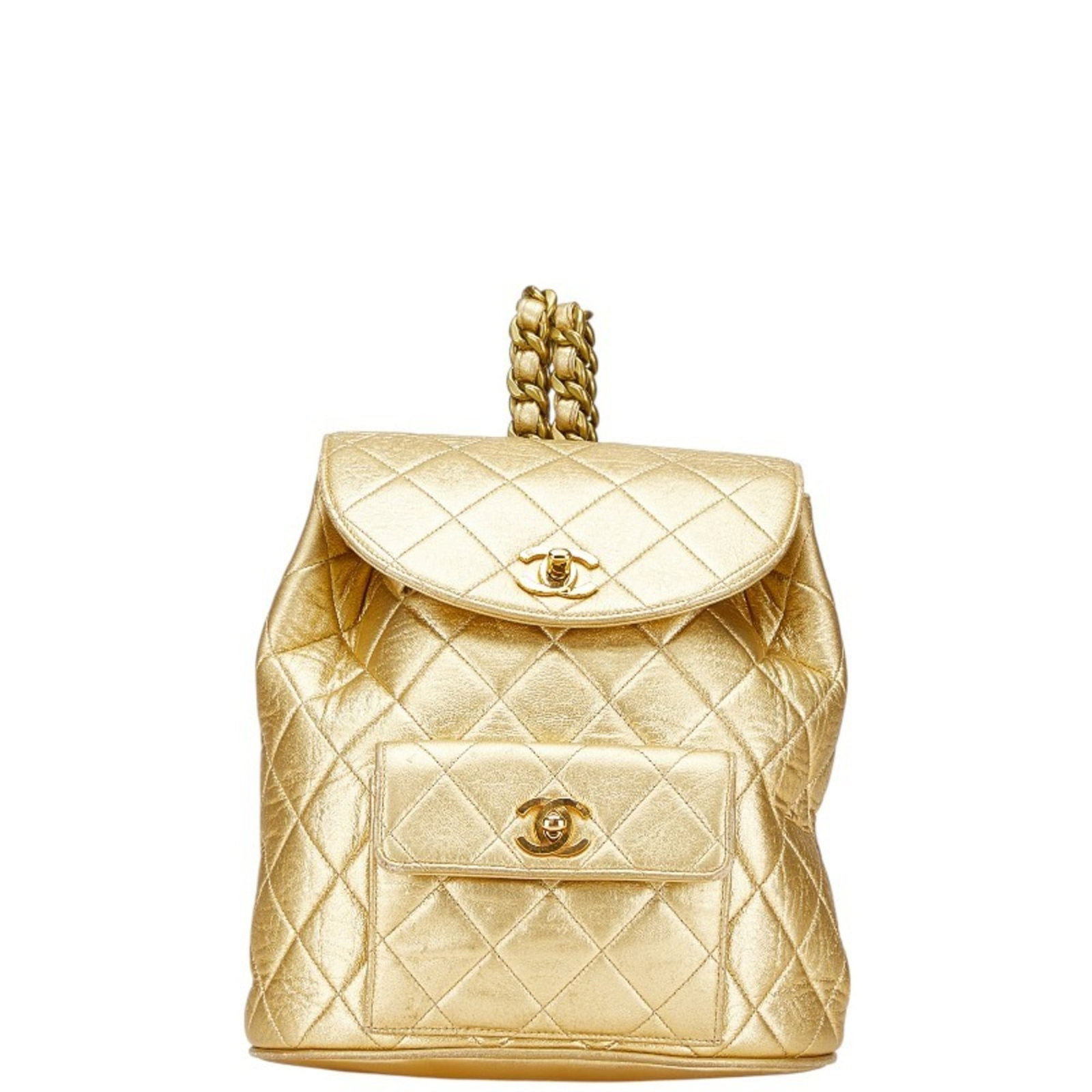 Backpack Leather by Chanel: Backpack Leather by Chanel Used Chanel Backpack in Gold Lambskin, featuring a classic design with leather trim and gold accents. The backpack measures 25cm x 21.5cm x 10cm and shows signs of moderate