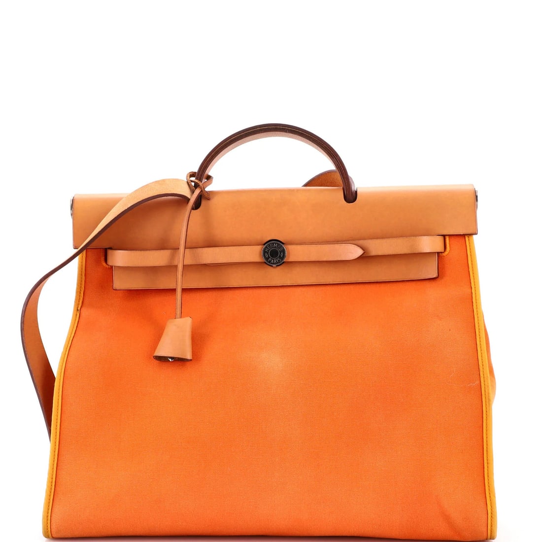 Hermes Herbag Toile Leather Zip And 39: Hermes Herbag Toile Leather Zip And 39 The Hermes Herbag Toile Leather Zip and 39 features a vibrant orange exterior with a rich, brown leather trim and a sturdy canvas interior. This stylish handbag