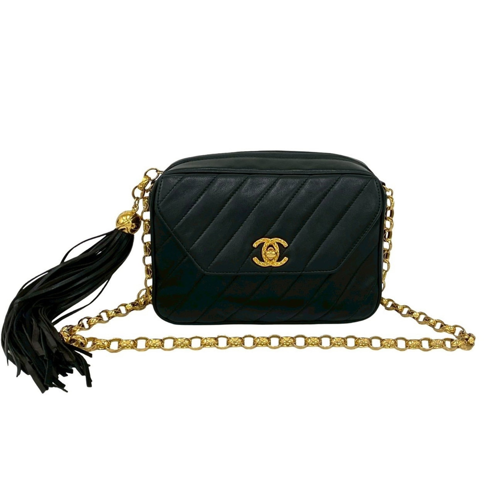 Shoulder Bag Leather: Shoulder Bag Leather This black lambskin shoulder bag from Chanel features classic design elements with subtle signs of wear, showcasing its well-loved condition. Measuring 12.5cm x 18.5cm x 7cm, it o