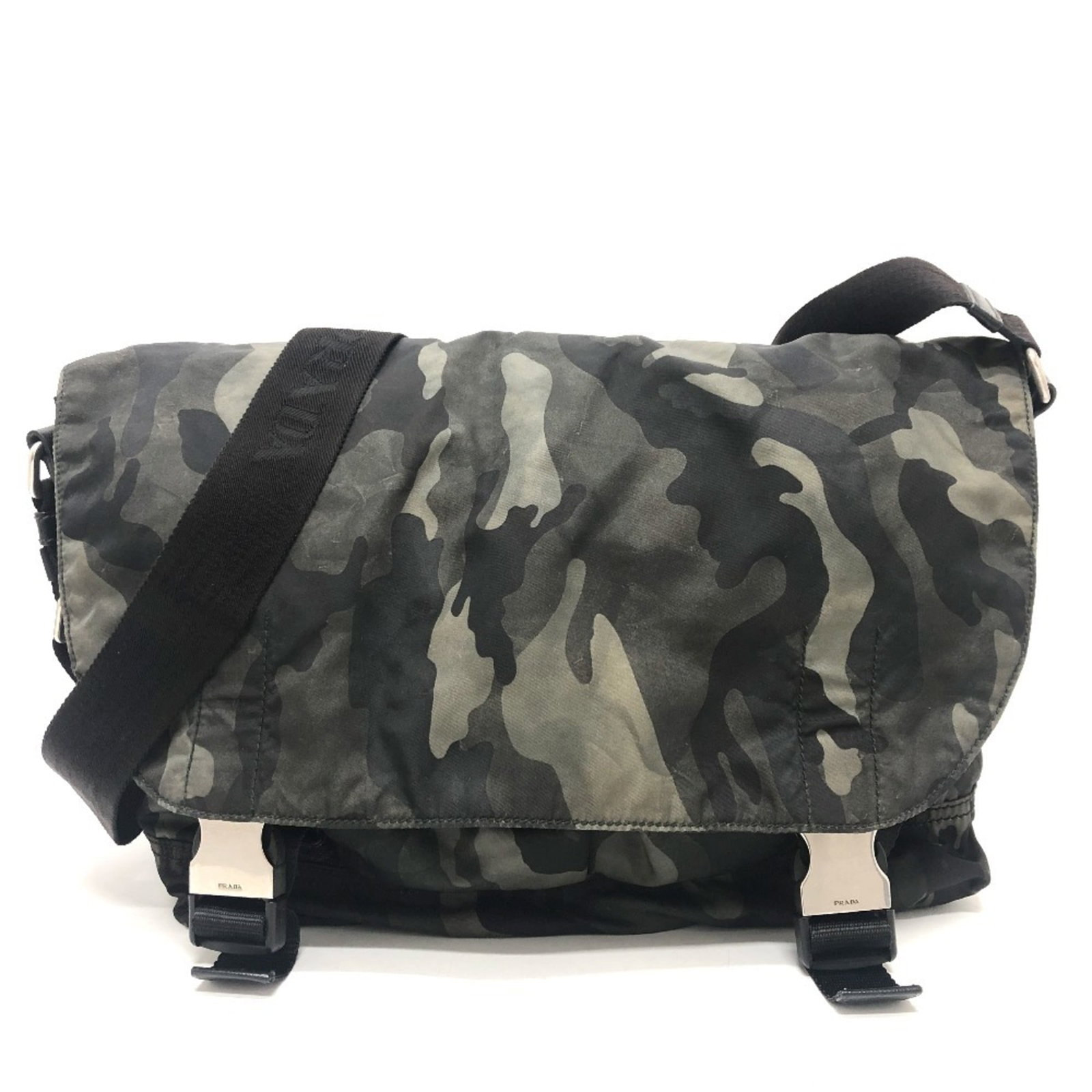 Nylon Shoulder Bag by Prada: Nylon Shoulder Bag by Prada Prada's Nylon Shoulder Bag features a striking green color and durable nylon material, making it a versatile accessory for everyday use. With its compact size and 15cm