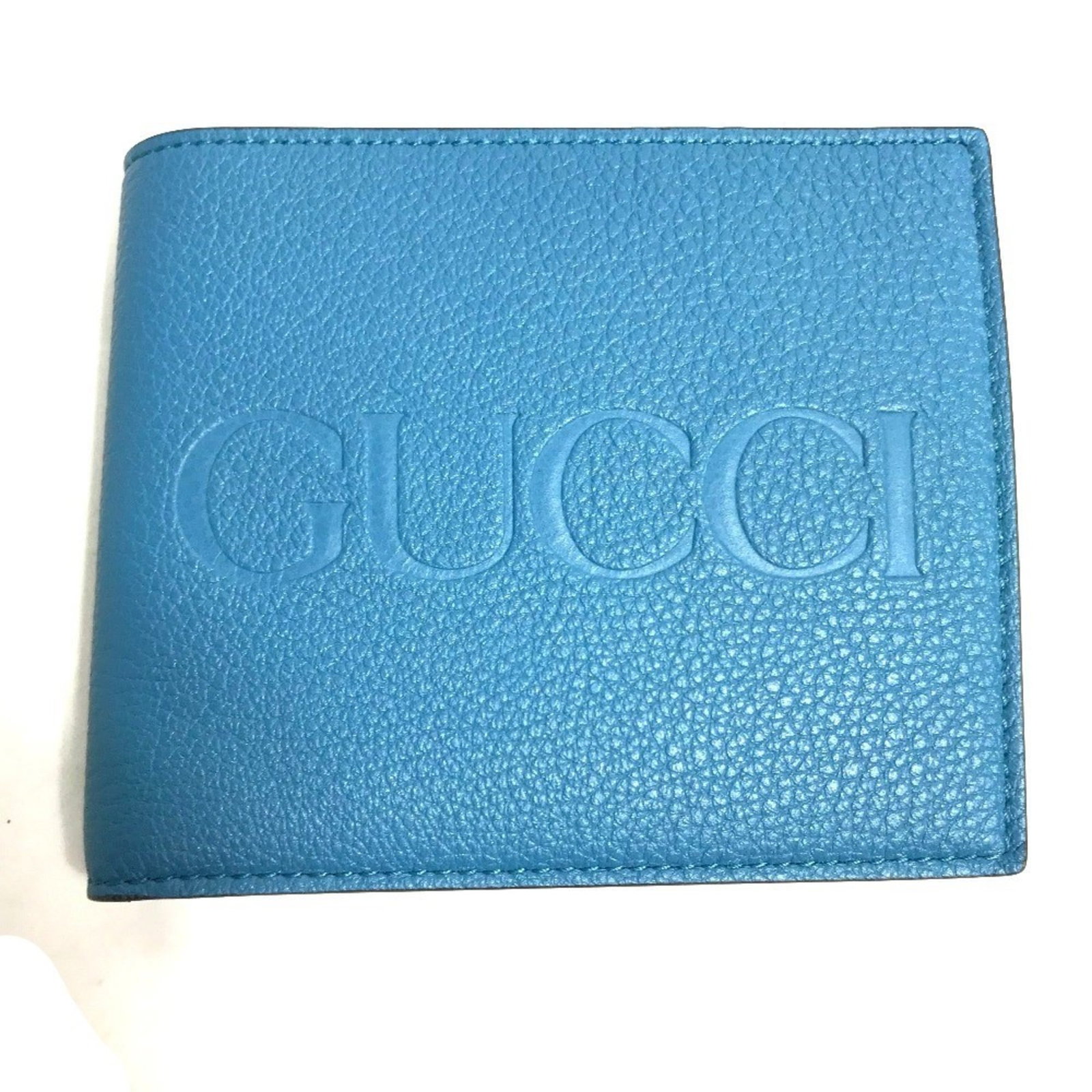 Gucci Wallet (Bi-Fold) Leather: Gucci Wallet (Bi-Fold) Leather This Gucci wallet boasts a sleek blue leather design, measuring 9cm x 11cm. In mint condition with minimal signs of wear, it features the iconic bi-fold style that has