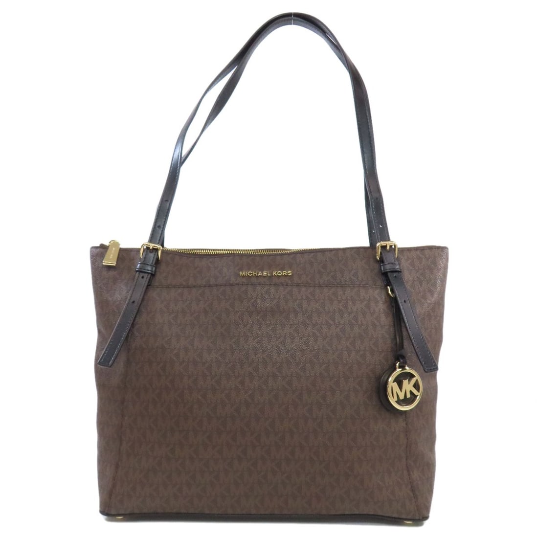 Signature tote bag pvc by michael kors: Signature tote bag pvc by michael kors Signature tote bag by Michael Kors in brown PVC exterior. This stylish tote bag features a distinctive design and signature from the artist, adding an extra
