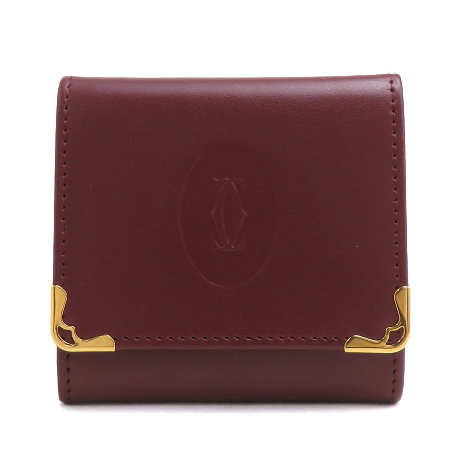 Coin Case Leather Purse Cartier: Coin Case Leather Purse Cartier Cartier's iconic coin purse features a rich Bordeaux leather exterior, adding a touch of sophistication to any accessory collection. With its compact size and classic d