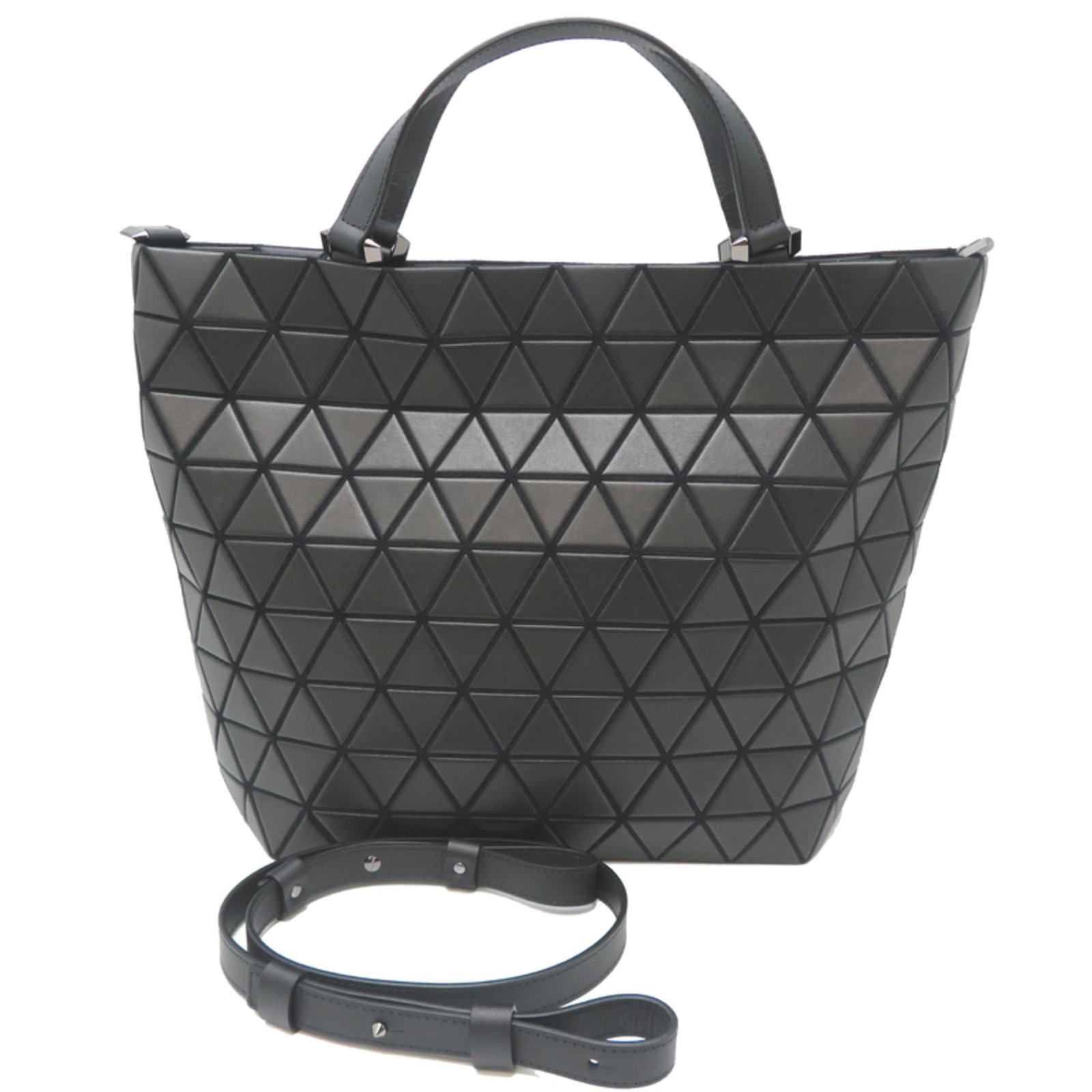 Tote bag by Issey Miyake: Tote bag by Issey Miyake The Issey Miyake tote bag boasts a sleek black design with a durable construction, measuring 28.5cm x 34cm x 10cm. Bearing the signature of its renowned Japanese designer, thi