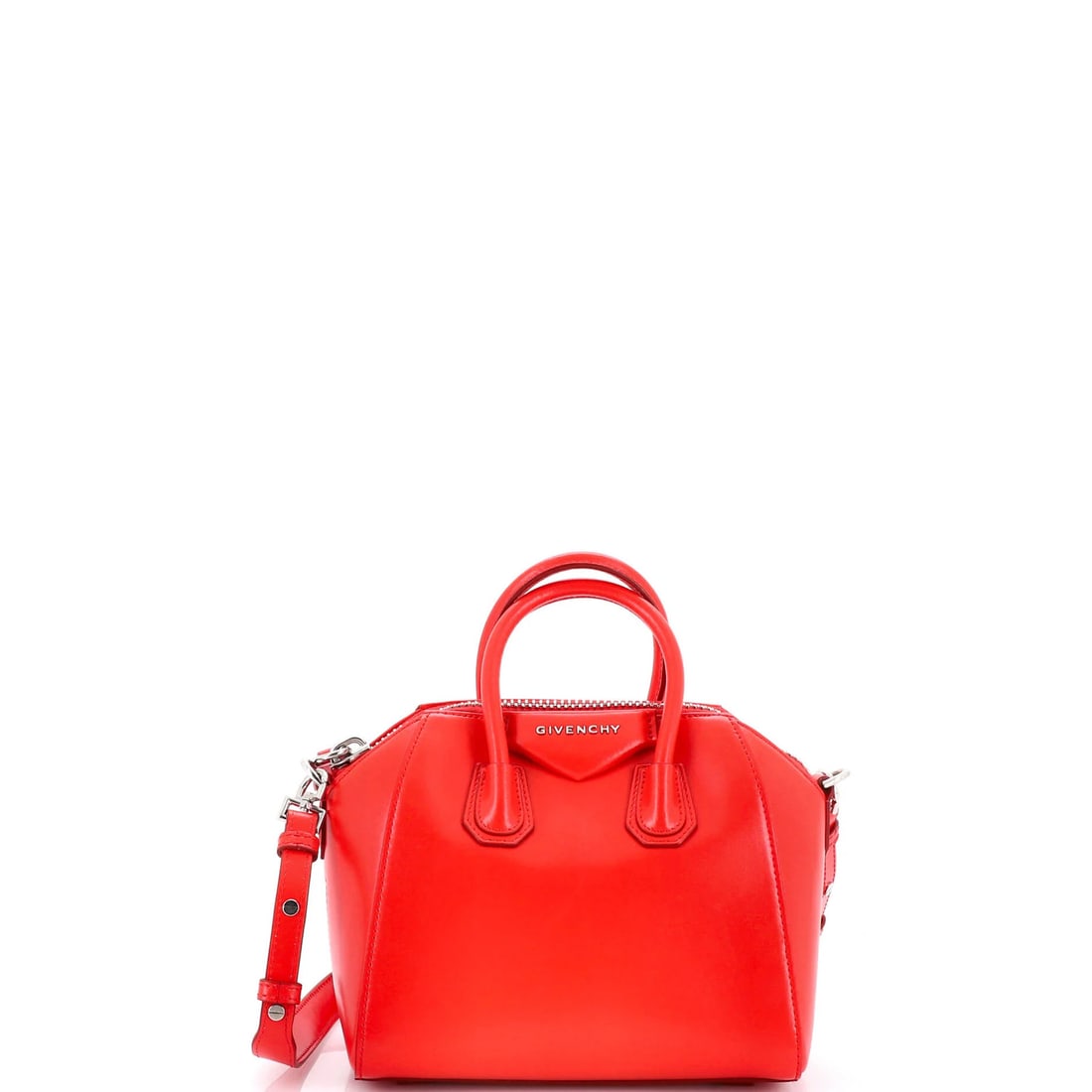 Glazed leather mini bag by Givenchy: Glazed leather mini bag by Givenchy Glazed leather mini bag by Givenchy, featuring a striking red exterior with neutral interior and silver hardware. This Antigona Bag boasts a sleek design with