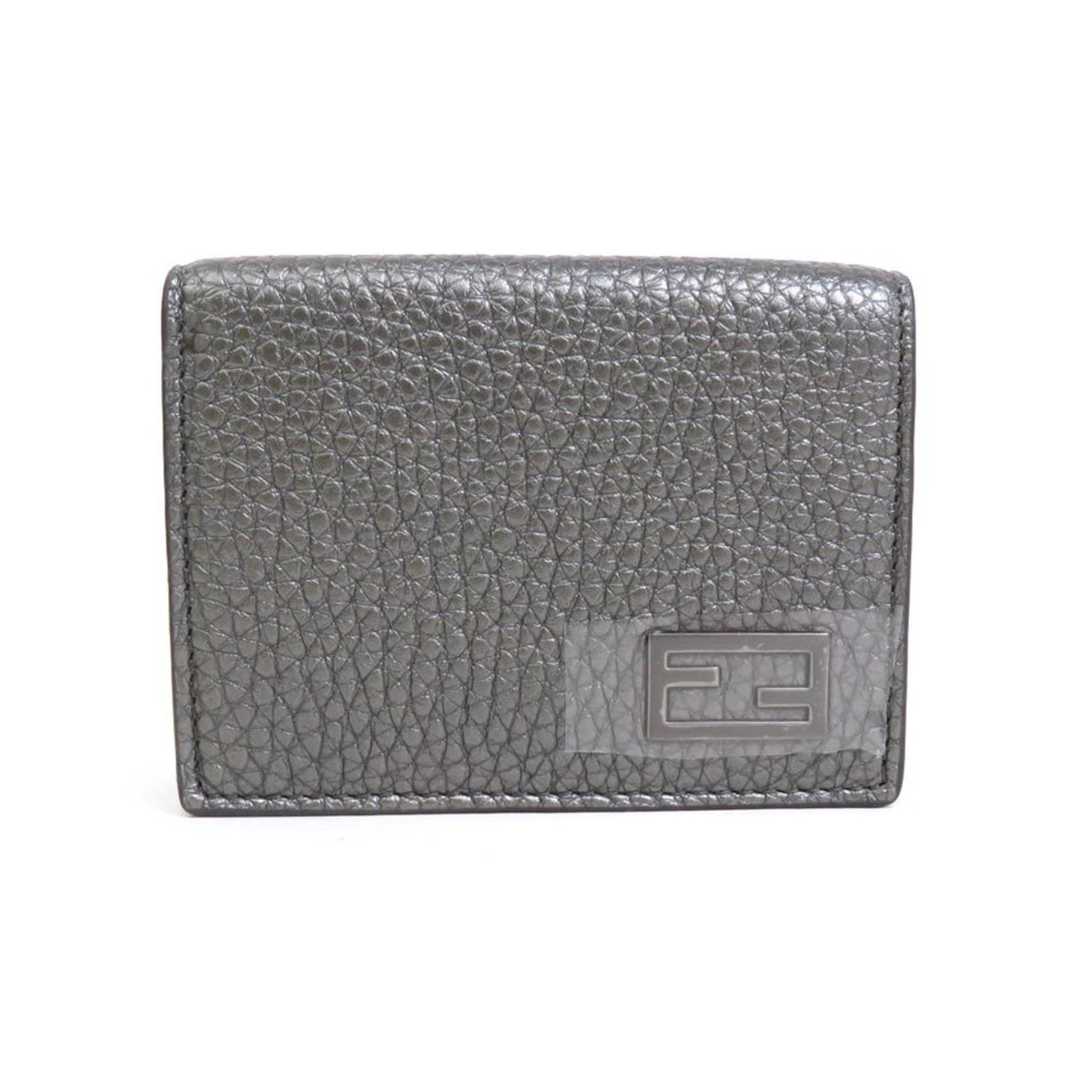 Fendi Wallet Leather Tri Fold: Fendi Wallet Leather Tri Fold Metallic Gray Fendi Wallet Leather Tri Fold in Very Good Condition. This tri-fold wallet features premium leather and a sleek metallic gray finish, measuring 7cm x 9.5cm