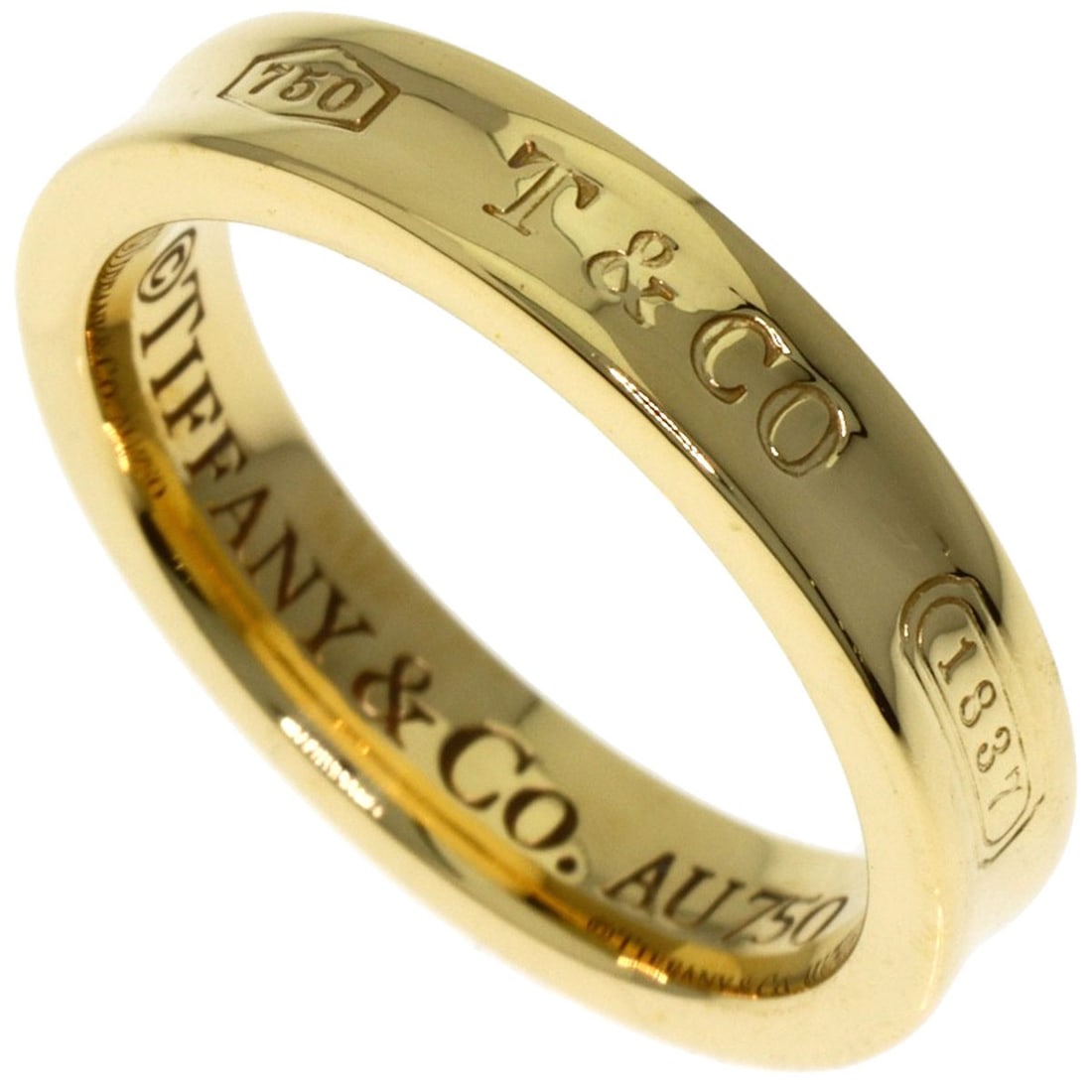Narrow Ring Tiffany Co K18 Yellow Gold 1837: Narrow Ring Tiffany Co K18 Yellow Gold 1837 Narrow ring in K18 yellow gold, bearing the signature of Tiffany & Co. from 1837, with a distinctive style and elegant design. This piece showcases the