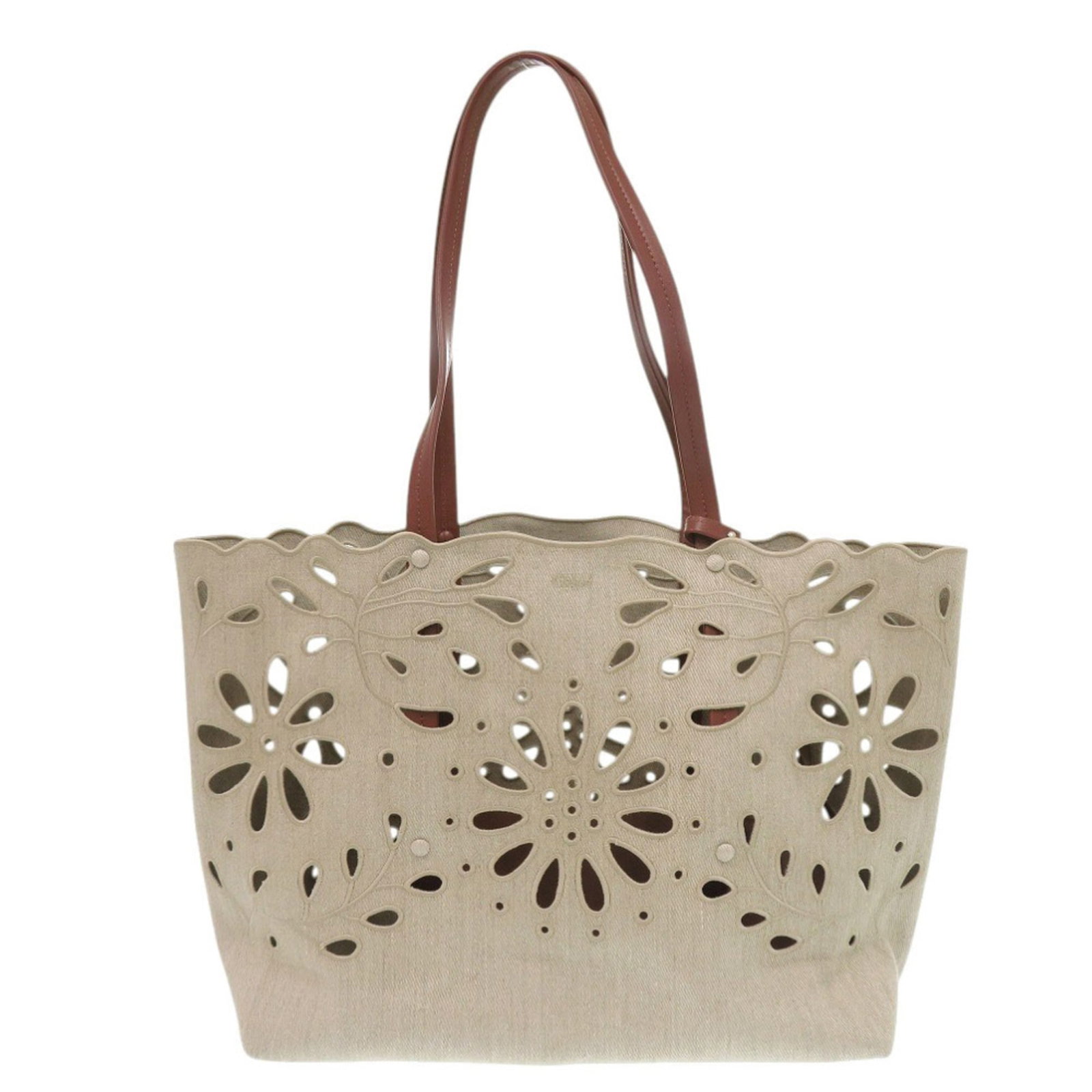 Linen Leather Tote Chlo Bag: Linen Leather Tote Chlo Bag Linen leather tote bag from Chlo, featuring natural beige and brown tones. With its classic design and durable materials, this versatile bag is perfect for everyday use.