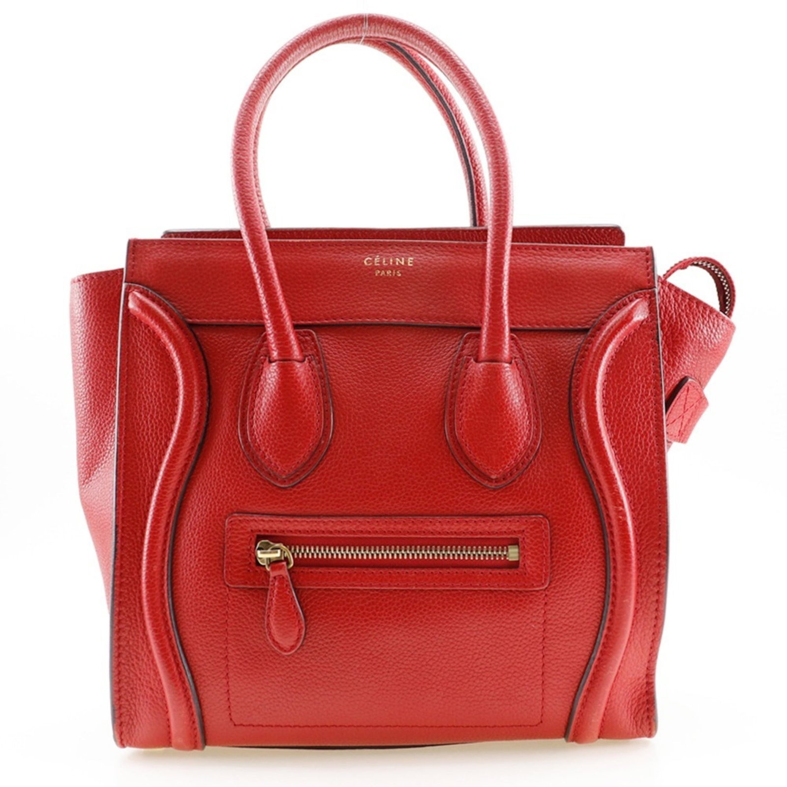 Handbag Leather Celine: Handbag Leather Celine This Celine handbag features high-quality red leather and has a classic design. Traces of usage are visible, with minor scratches and dirt, but overall it remains in good