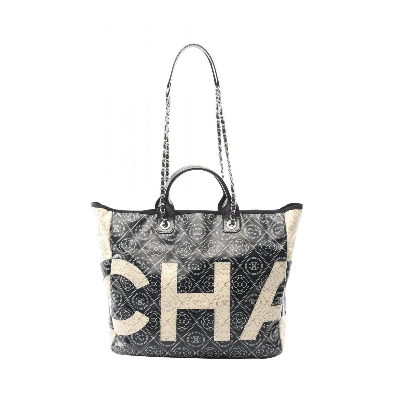 Canvas Leather Tote Coated By Chanel: Canvas Leather Tote Coated By Chanel Coated canvas and leather blend in this timeless Chanel tote, featuring silver hardware in a classic beige and black color combination. With its clean lines and un