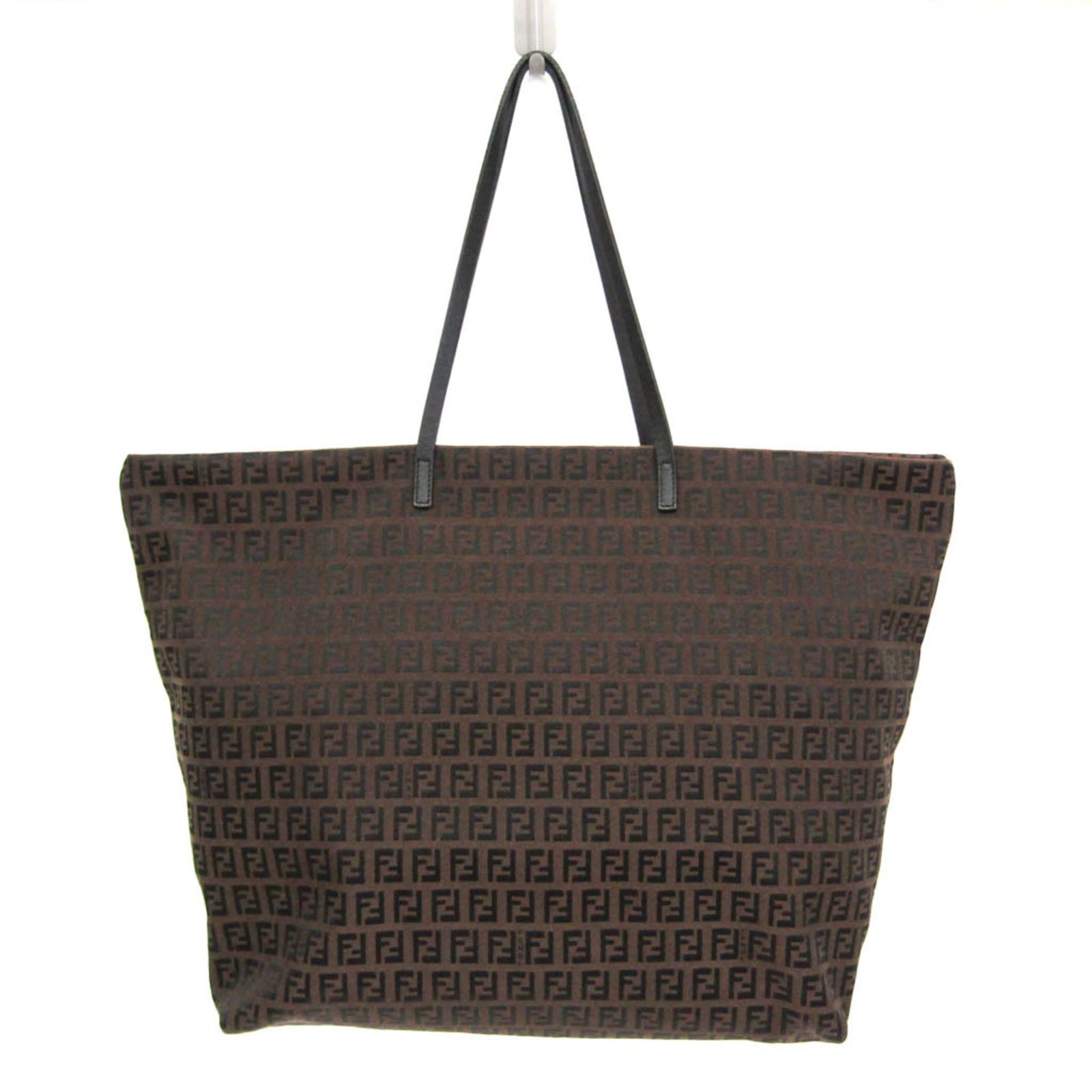 Fendi Tote Bag Canvas Leather: Fendi Tote Bag Canvas Leather Brown Fendi Tote Bag with Canvas and Leather Construction. This versatile tote features a sturdy canvas exterior, a leather trim, and a zipper closure for easy access.