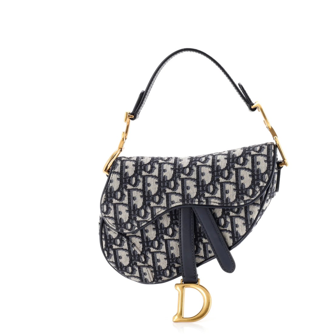 Christian Dior Saddle Handbag Oblique Canvas Mini: Christian Dior Saddle Handbag Oblique Canvas Mini The Christian Dior Saddle Handbag Oblique Canvas Mini boasts a striking blue canvas exterior, perfectly balanced by neutral interior and gold