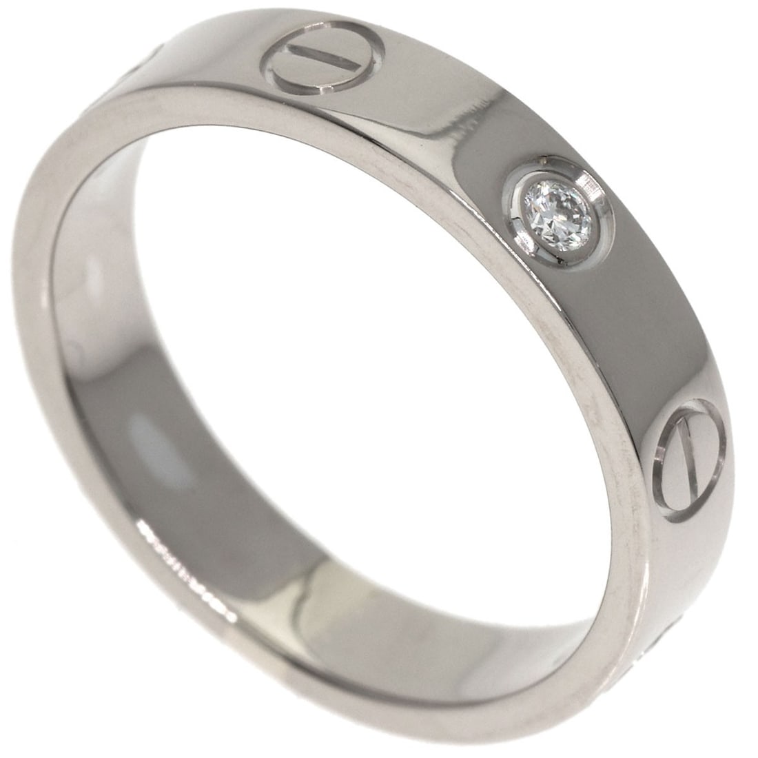 Cartier Mini Love Ring 1P Diamond Ring K18 White Gold: Cartier Mini Love Ring 1P Diamond Ring K18 White Gold Cartier's Mini Love Ring boasts a sleek, silver K18 white gold design. This petite diamond ring features a main stone set against a bed of silver