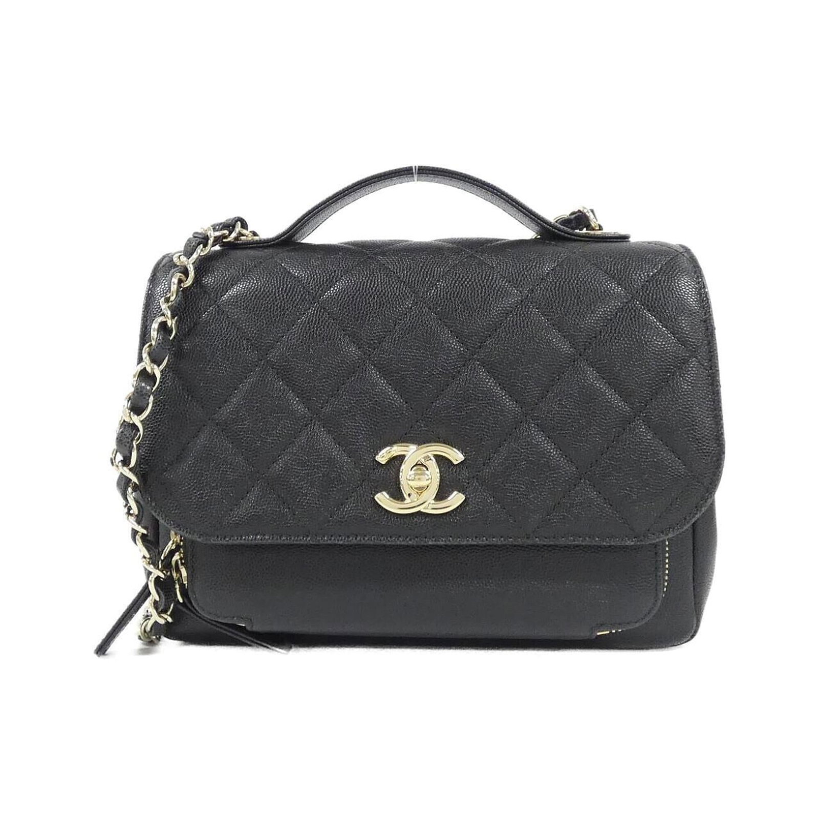 Calfskin Grained Chanel Handbag: Calfskin Grained Chanel Handbag Grained Calfskin Chanel Handbag in Black. This classic handbag boasts a timeless design and premium material, featuring a subtle grain pattern that adds depth to its