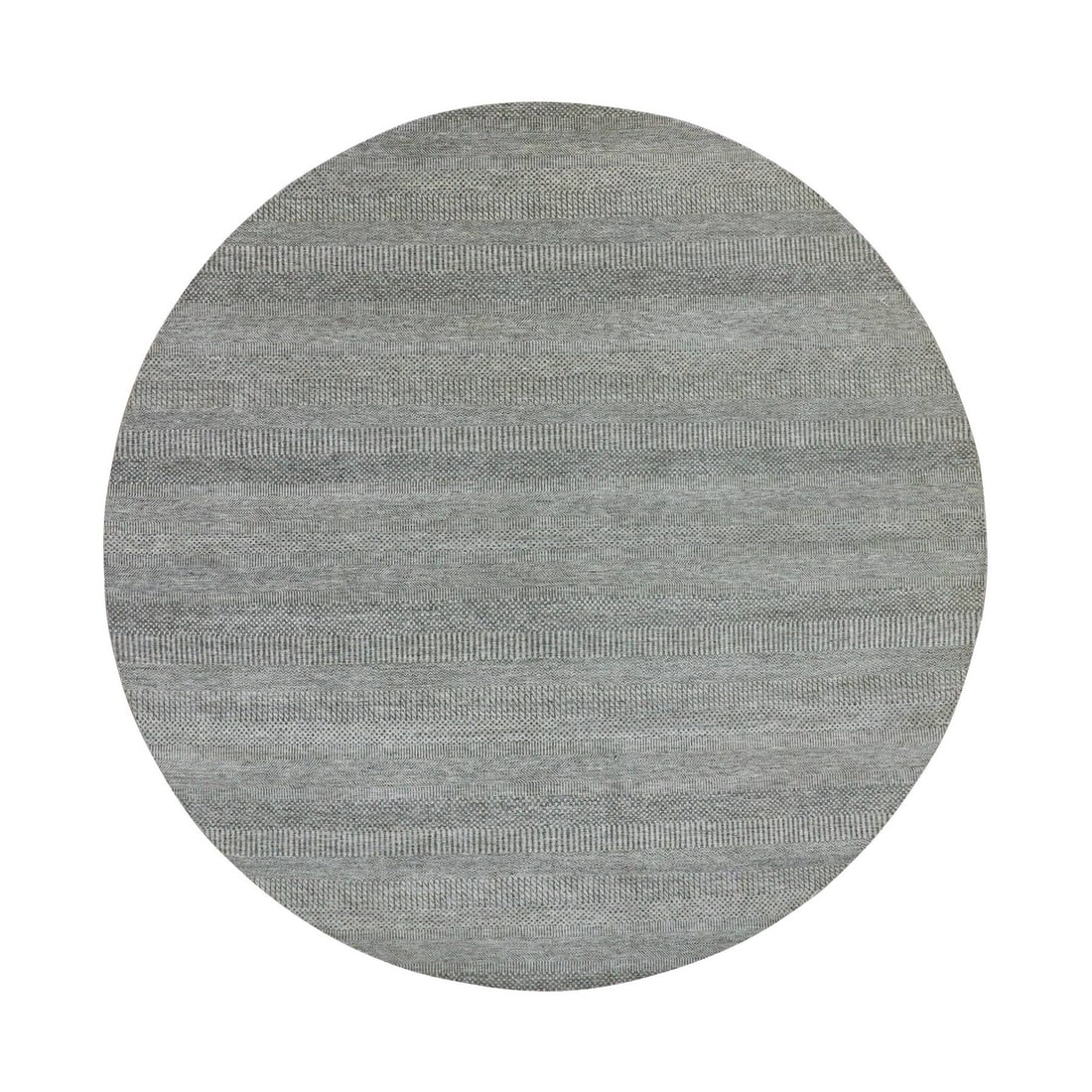 10'x10' Trout Gray Hand Knotted Modern Grass Design Undyed Wool Round Rug: 10'x10' Trout Gray Hand Knotted Modern Grass Design Undyed Wool Round Rug The Trout Gray Hand Knotted Modern Grass Design Undyed Wool Round Rug boasts a stunning, undyed grey color and intricate flatw