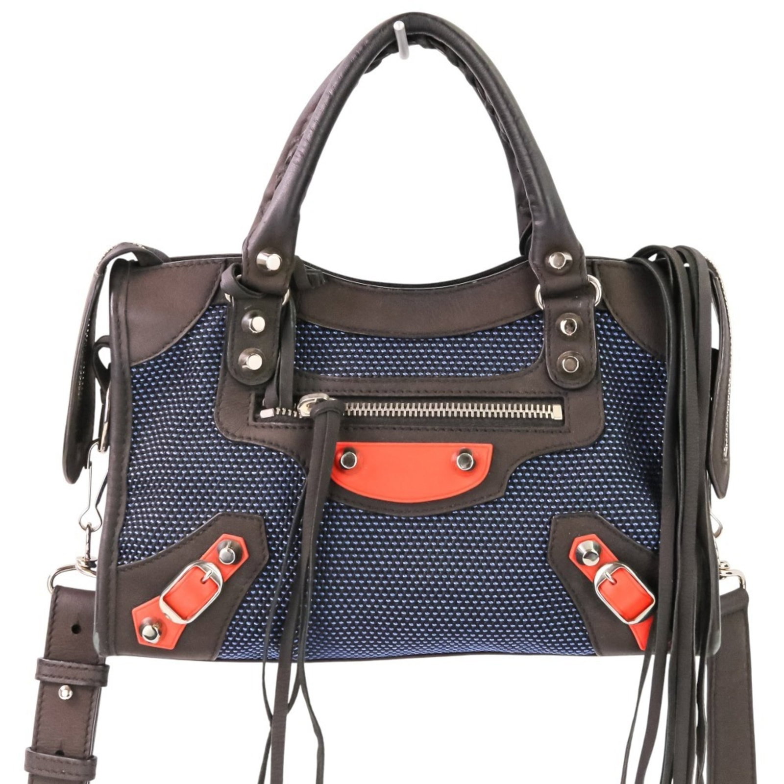 Balenciaga Handbag: Balenciaga Handbag Dark Brown, Navy, and Orange hues are showcased in this pre-owned Balenciaga handbag, featuring a unique size and condition. The bag boasts a few traces of usage, some scratches
