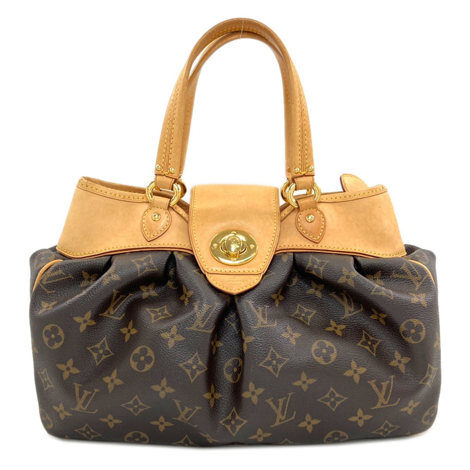 Monogram Louis Vuitton Handbag: Monogram Louis Vuitton Handbag Monogram Louis Vuitton Handbag. This classic handbag features the iconic monogram pattern and has been well-loved, with traces of usage visible in its condition. With a 