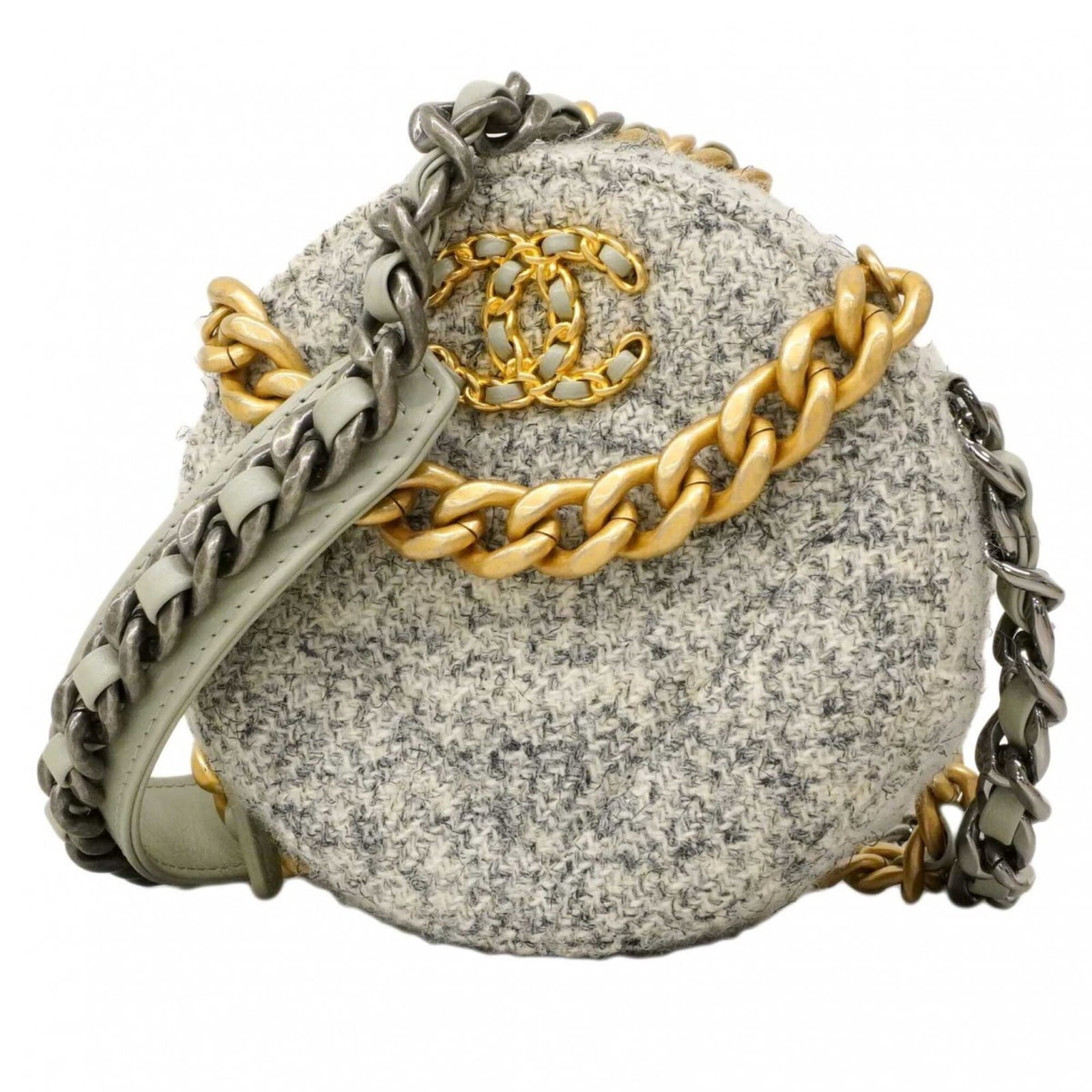 Tweed Handbag by Chanel: Tweed Handbag by Chanel Gray tweed handbag from Chanel, featuring gold and silver hardware. This used item has some scratches and dirt but remains in very good condition. Measuring 12.5cm x 12.5cm x