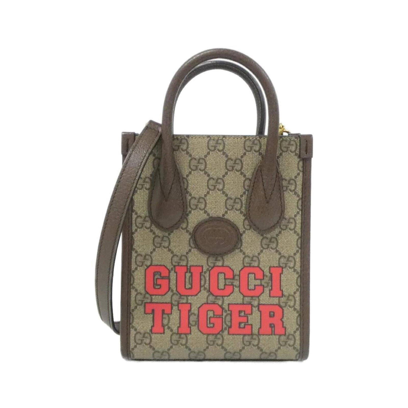 Handbag Canvas by Gucci: Handbag Canvas by Gucci Canvas by Gucci in beige and brown tones, with a classic design and subtle scratches from previous use. This handbag measures 19cm x 16cm x 7cm and features canvas material.