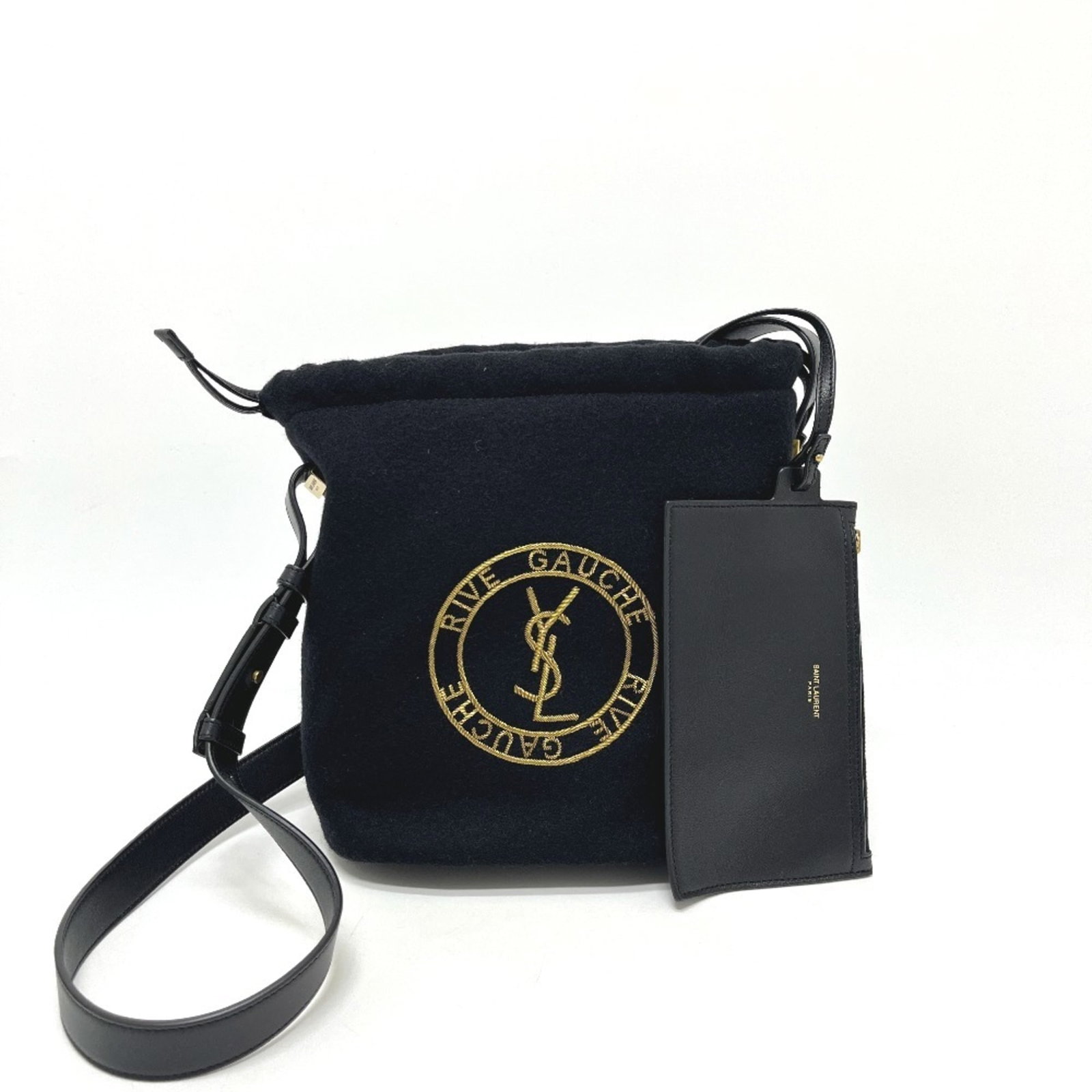 Saint Laurent Yves Handbag Shoulder Canvas: Saint Laurent Yves Handbag Shoulder Canvas Canvas shoulder bag in black with gold hardware, measuring 24cm x 20cm x 12.5cm and featuring a 110cm strap length. This Yves Saint Laurent handbag is in