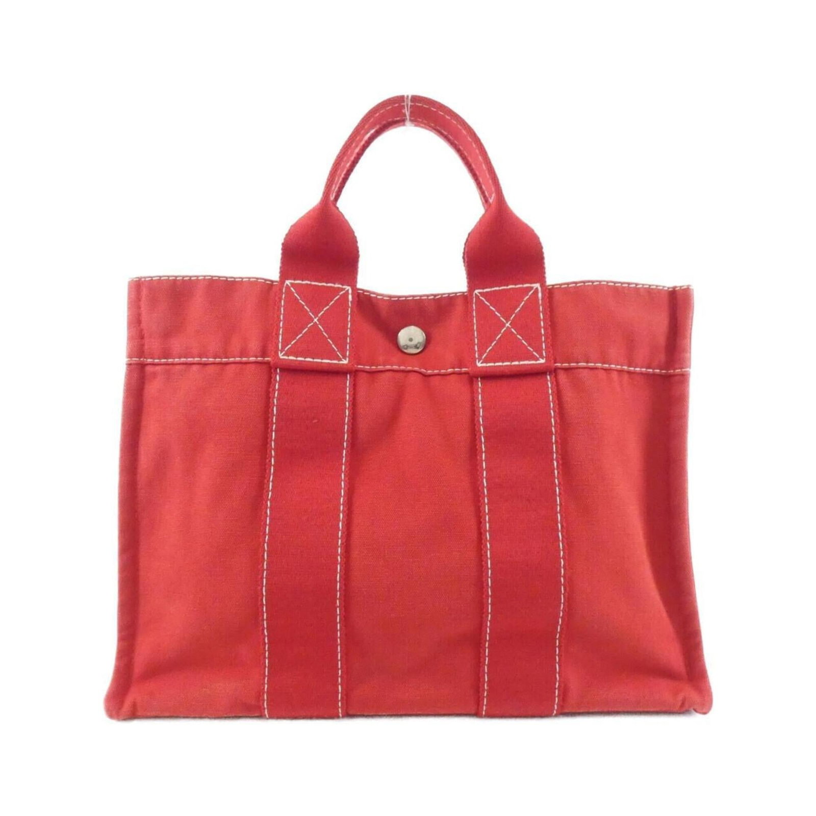 Canvas Handbag Hermes: Canvas Handbag Hermes Canvas Handbag in Red, a stylish and versatile accessory. This used Hermes handbag features canvas material, a classic red color, and measures 23cm x 30cm x 8cm. With traces of