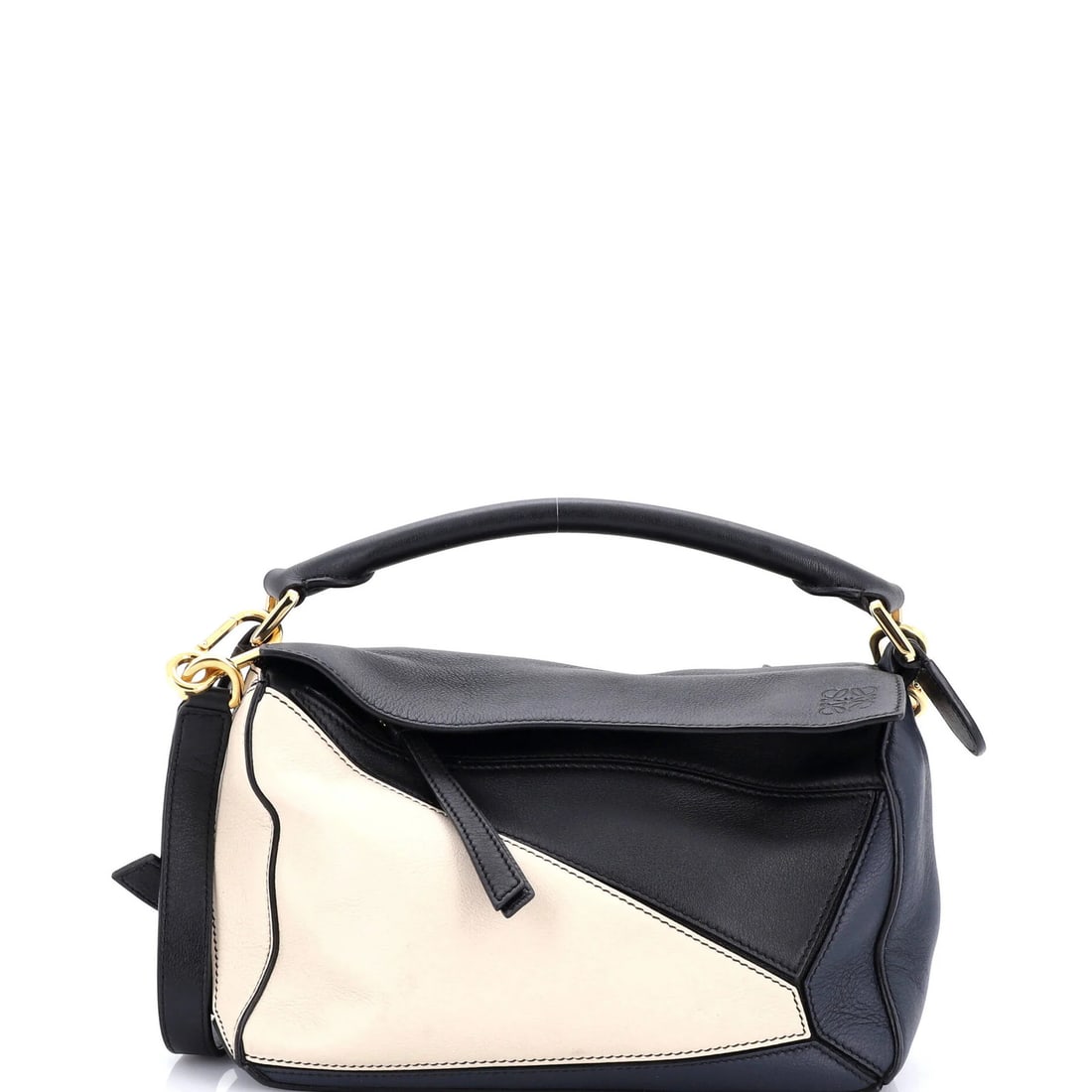 Leather Small Puzzle Bag Loewe: Leather Small Puzzle Bag Loewe Small Leather Puzzle Bag from Loewe, featuring a classic black exterior with gold hardware and neutral interior. This compact satchel measures 6" tall and 9" wide, with 