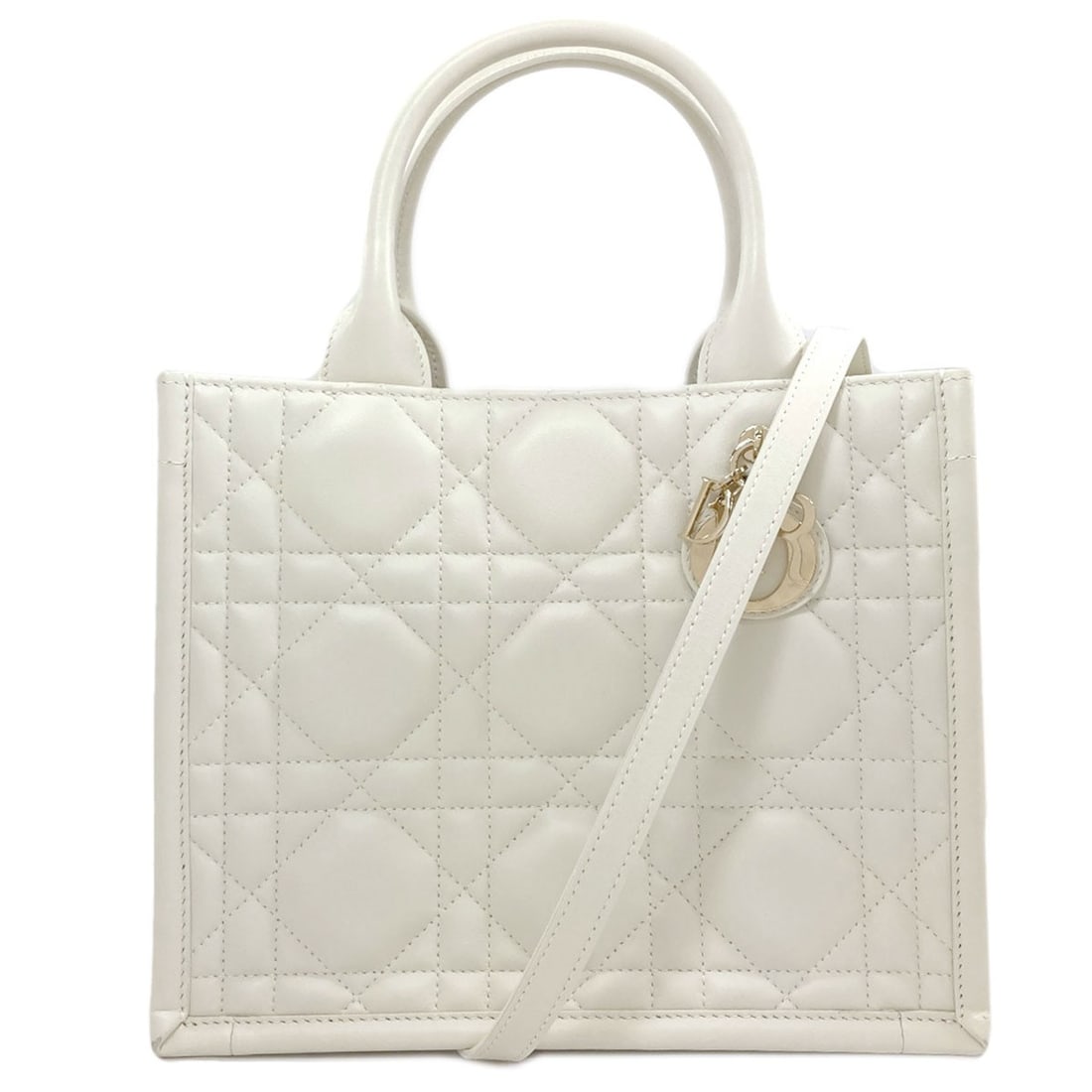 Calf handbag Christian Dior 2Way: Calf handbag Christian Dior 2Way White Calf Christian Dior 2Way Handbag. The bag's exterior features a white calf material, while its interior bears no additional details. This handbag is in the