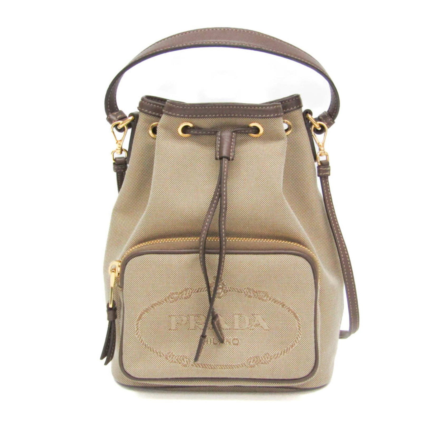 Handbag Leather Jacquard Shoulder Prada: Handbag Leather Jacquard Shoulder Prada Prada's Handbag Leather Jacquard Shoulder Bag boasts a rich, beige brown and dark brown color combination. The bag features a zipper pocket, string closure, and