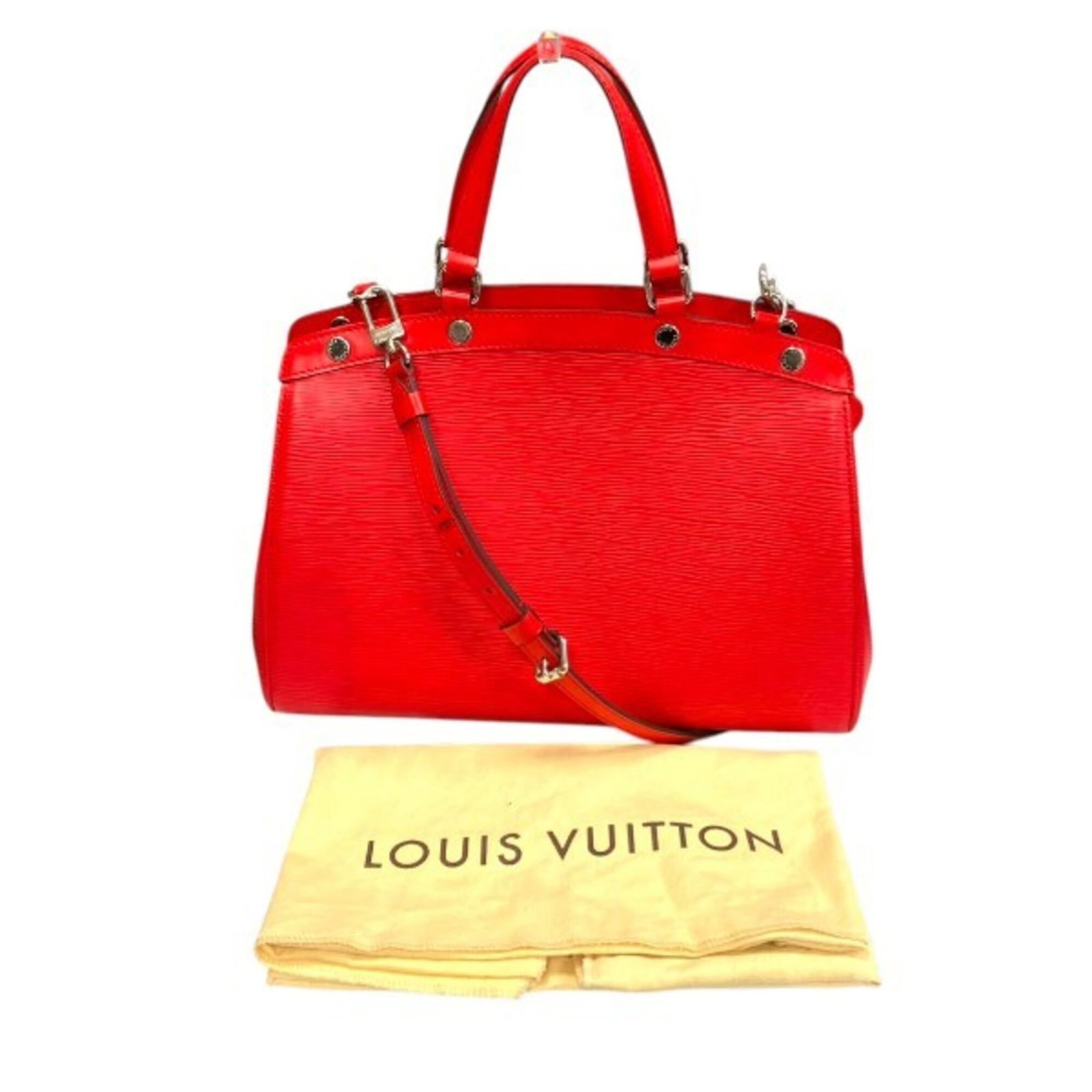 Epi Leather Handbag Shoulder Louis Vuitton: Epi Leather Handbag Shoulder Louis Vuitton Carmine Epi Leather Shoulder Bag from Louis Vuitton, featuring the iconic monogram pattern and durable Epi leather construction. This pre-owned shoulder bag 
