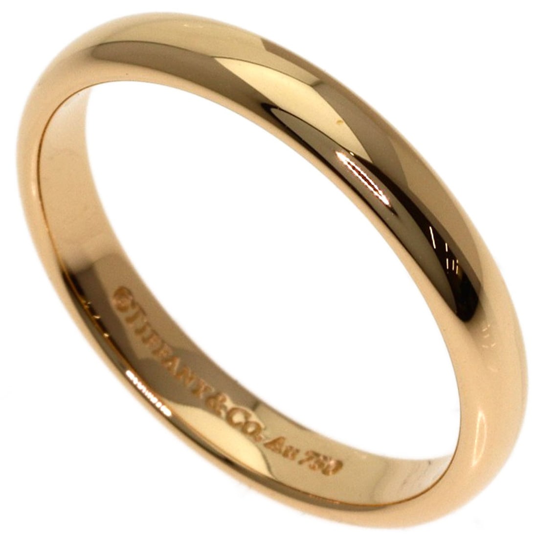 K18 Pink Gold Tiffany & Co. Wedding Ring: K18 Pink Gold Tiffany & Co. Wedding Ring K18 Pink Gold Tiffany & Co. Wedding Ring, crafted from high-quality K18 pink gold, features a classic design with no main stone. This elegant ring is