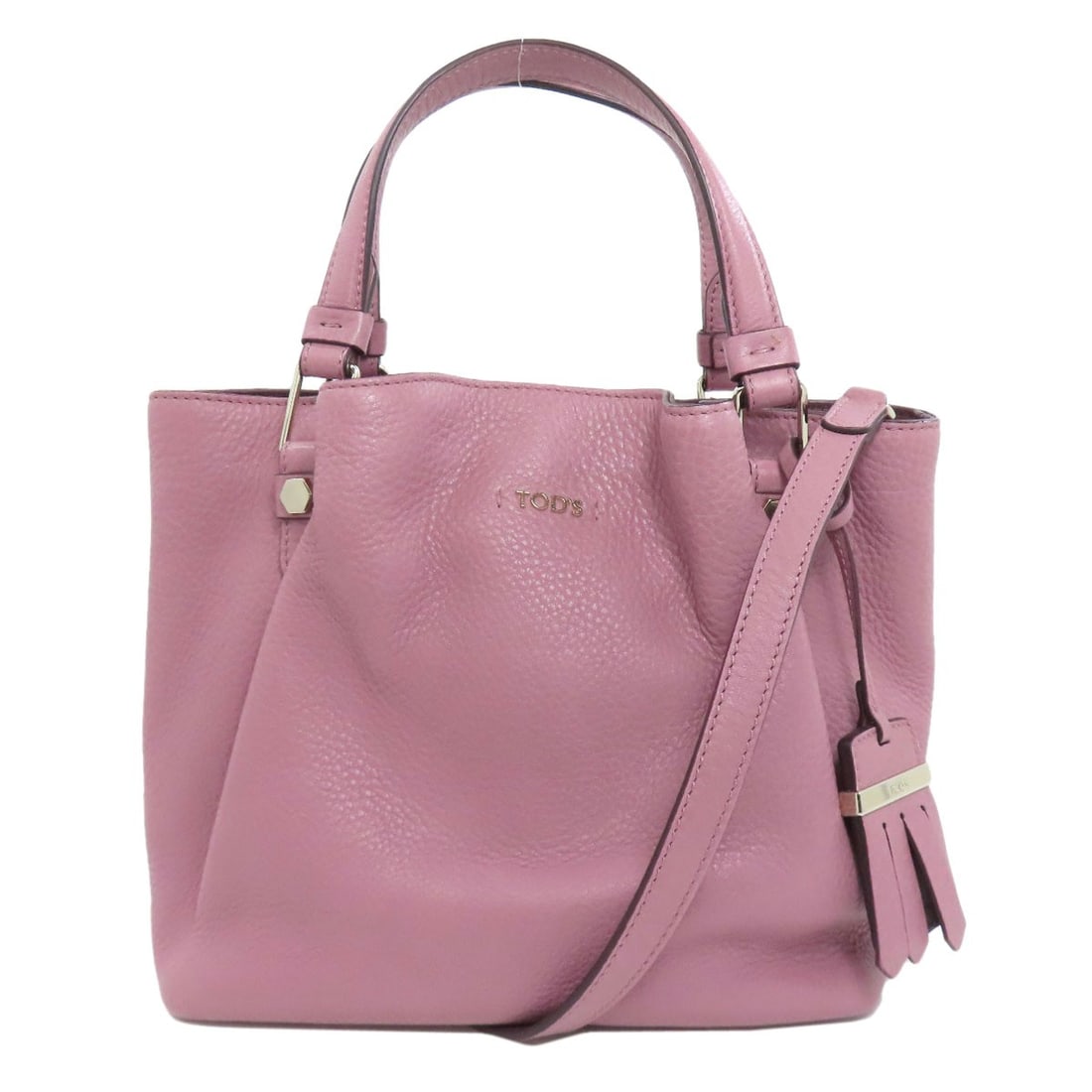Tods 2Way Handbag Leather: Tods 2Way Handbag Leather Pink leather Tods handbag with a unique 2Way design. This stylish bag features exterior material made from high-quality leather, showcasing a vibrant pink color that adds a