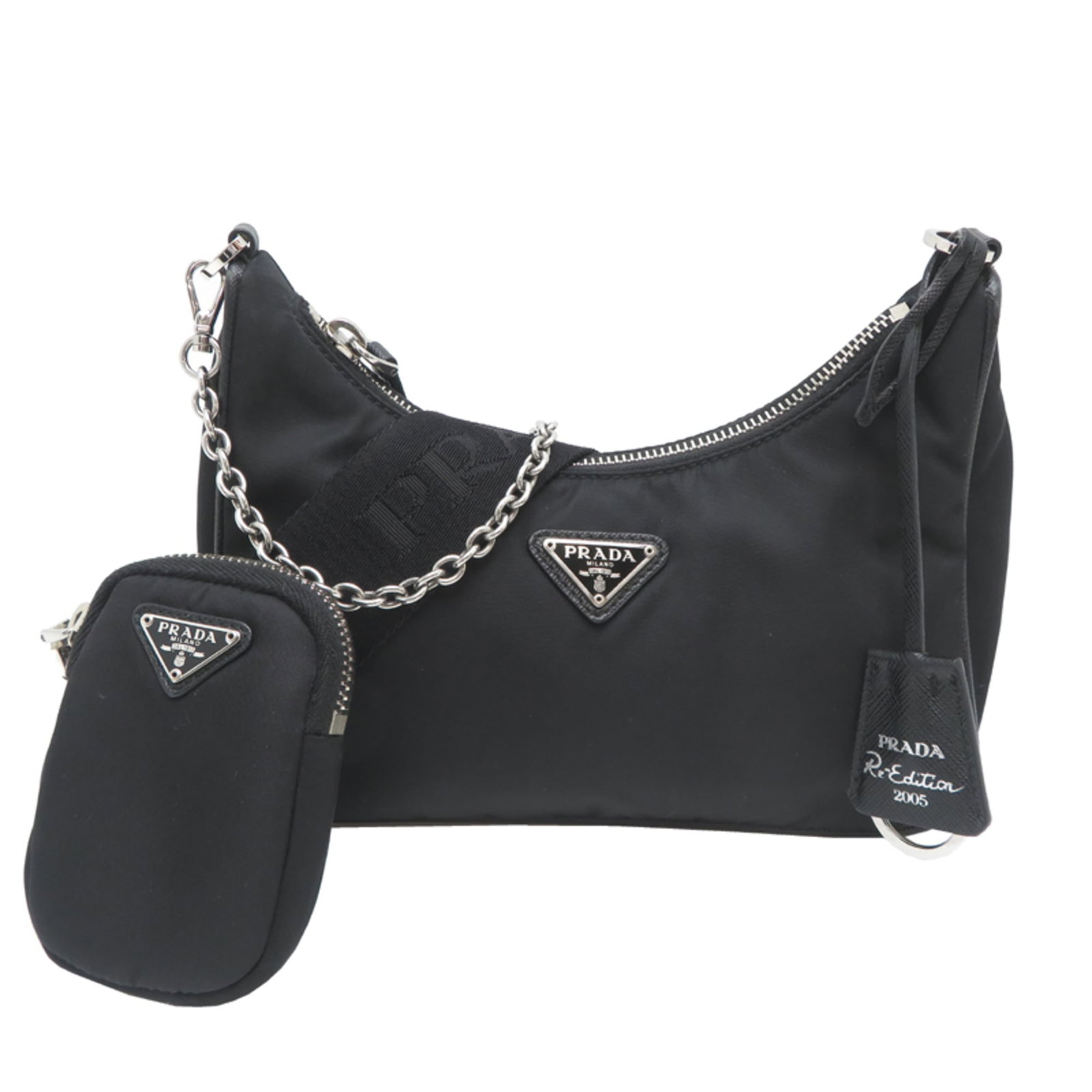 Nylon Shoulder Bag by Prada: Nylon Shoulder Bag by Prada Black nylon shoulder bag by Prada, featuring a sleek design with a few traces of usage and some minor scratches. The bag's condition is very good, with only slight signs