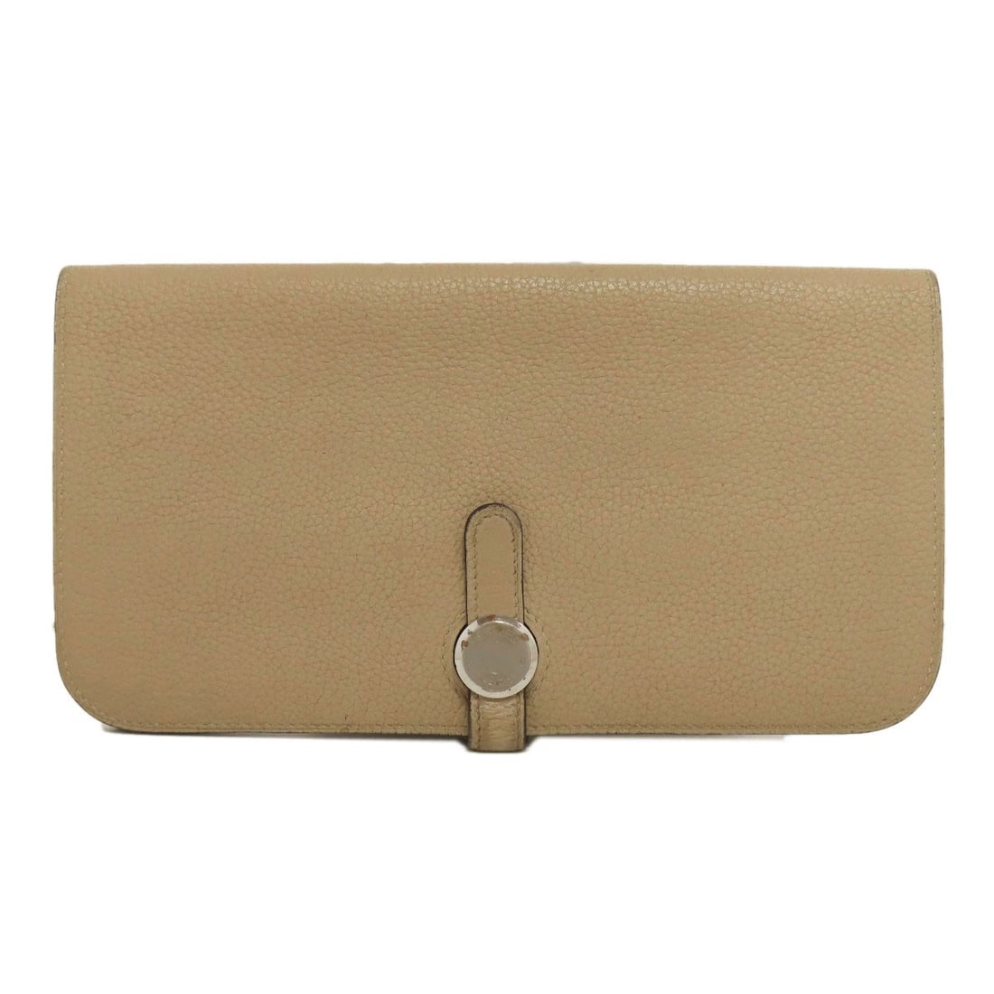 Hermes Dogon Long Silverhardware Long Wallet (With Coin Pocket) Taurillon: Hermes Dogon Long Silverhardware Long Wallet (With Coin Pocket) Taurillon Taurillon clemence leather wraps around the edges of this long wallet, adding a touch of sophistication. The coin pocket and s