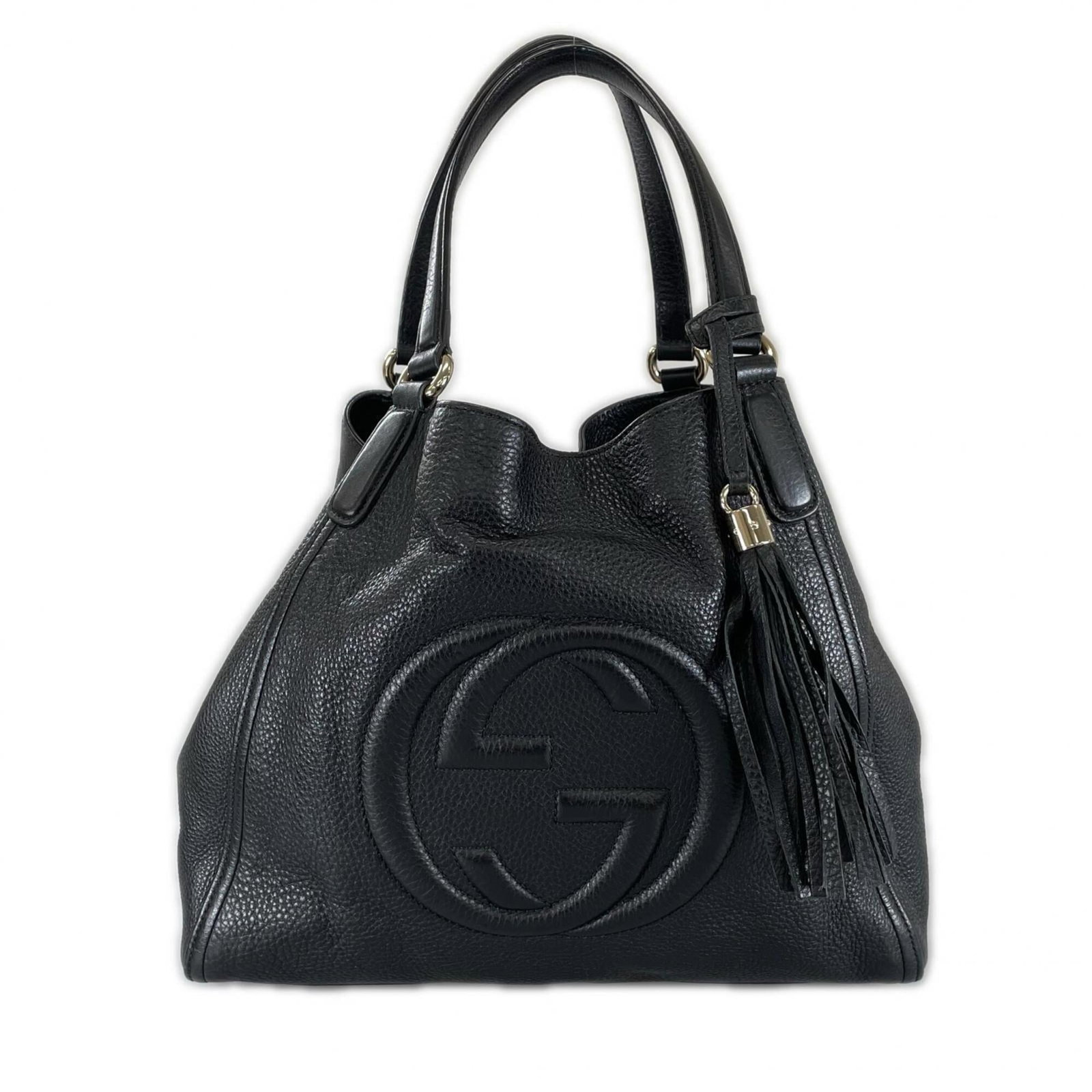 Tote bag leather by Gucci: Tote bag leather by Gucci This Gucci leather tote bag boasts sleek black leather and silver hardware, showcasing the iconic Italian brand's signature style. Measuring 30cm x 34cm x 11cm, it features