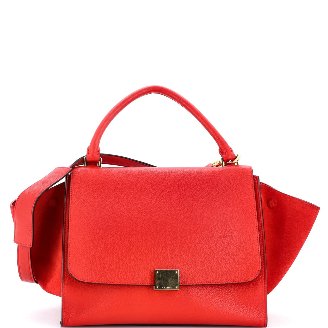 Celine Trapeze bag medium leather: Celine Trapeze bag medium leather Red Celine Trapeze bag in medium leather features a classic top handle design with suede accents. The bag measures 9" tall, 12" wide, and 7" deep, with a 4.5" drop