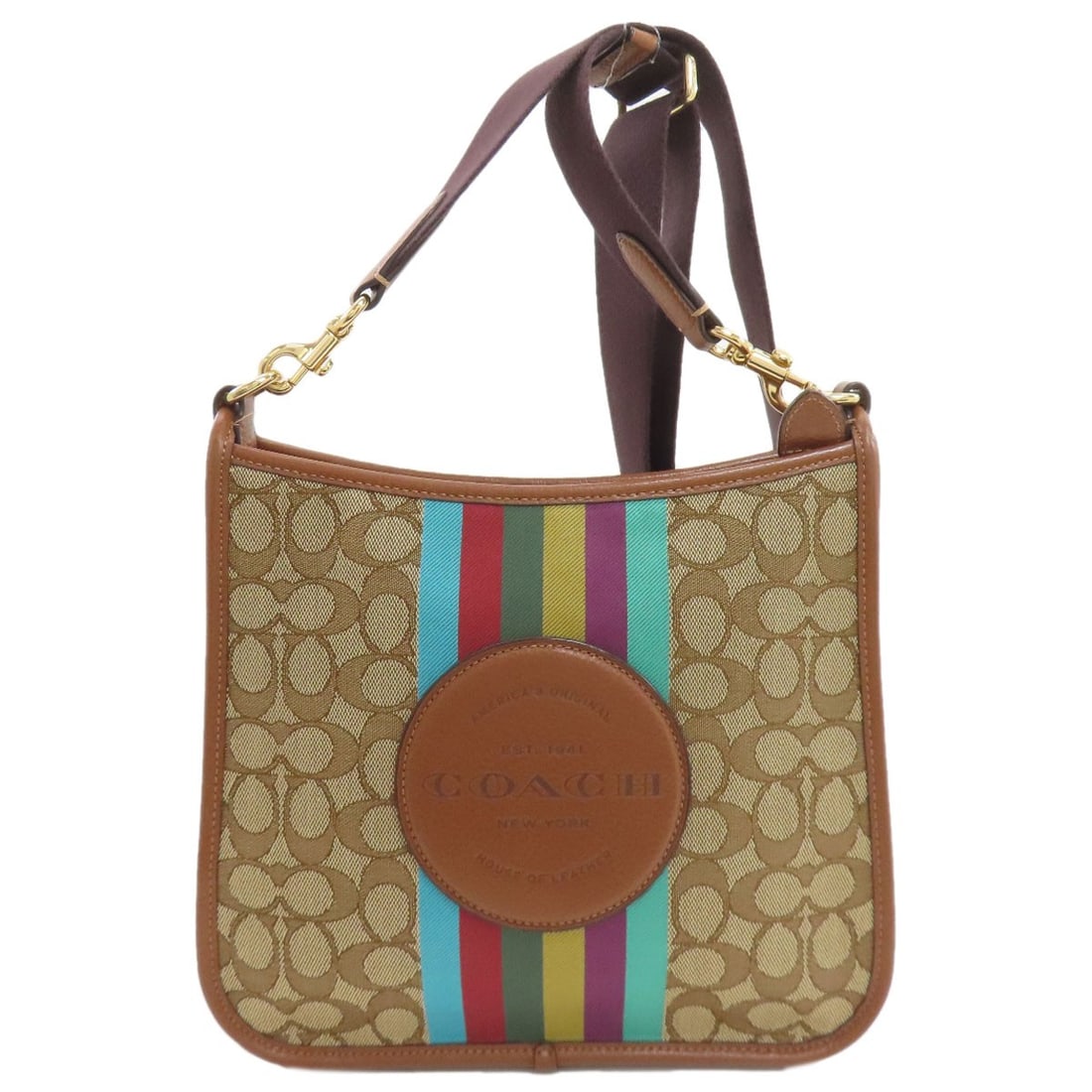 Signature Canvas Coach Cc144 Bag Shoulder: Signature Canvas Coach Cc144 Bag Shoulder Brown canvas shoulder bag from COACH, featuring a classic design with a signature on the exterior. This stylish bag boasts a timeless look and feel, making