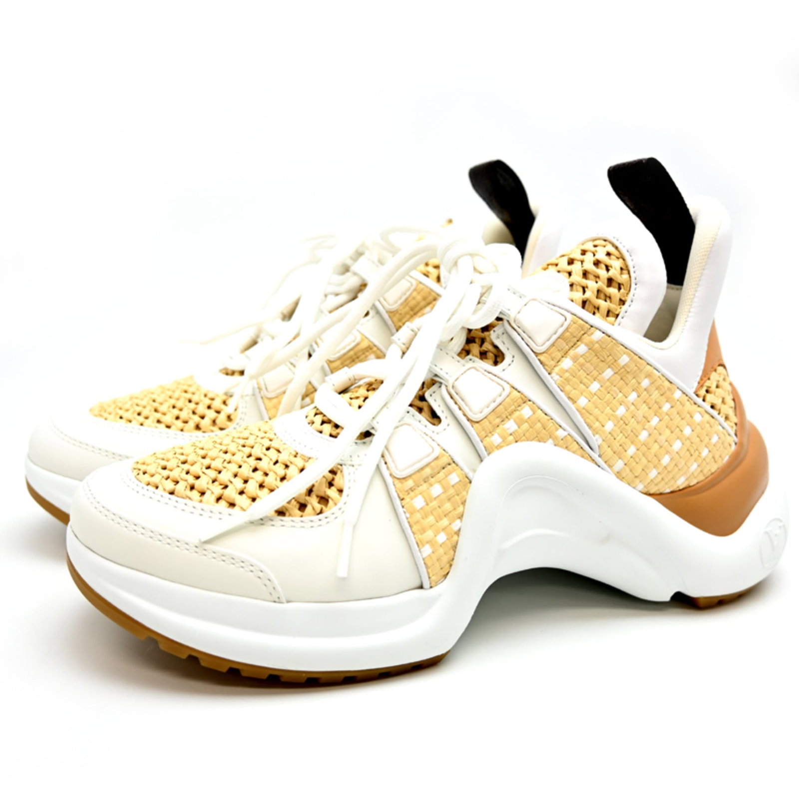 Louis Vuitton Sneakers: Louis Vuitton Sneakers Sneakers from Louis Vuitton, featuring the brand's iconic design. Made in beige and white colors, these shoes are in mint condition, like new. Used but well-maintained, they