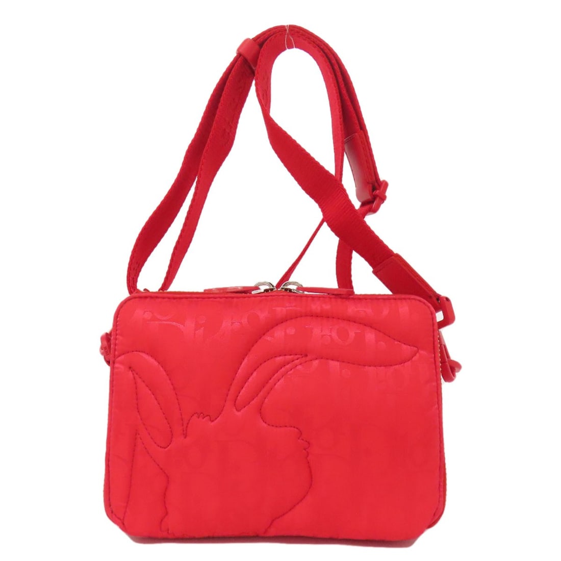 Christian Dior Erl Collaboration Trotter Pattern Mirage Shoulder Bag Nylon: Christian Dior Erl Collaboration Trotter Pattern Mirage Shoulder Bag Nylon Red nylon Christian Dior Erl Collaboration Trotter Pattern Mirage Shoulder Bag. This bold red shoulder bag features the