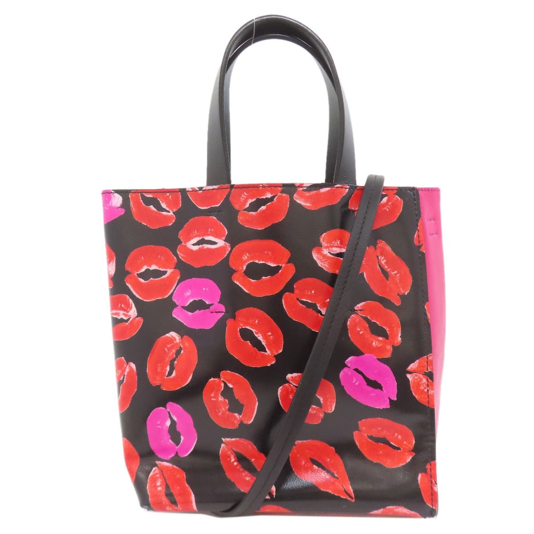 Marni Museeo Lip Pattern 2Way Handbag Leather: Marni Museeo Lip Pattern 2Way Handbag Leather Pink leather handbag with a unique lip pattern design, created by MARNI. This 2-way handbag features a striking exterior color and high-quality