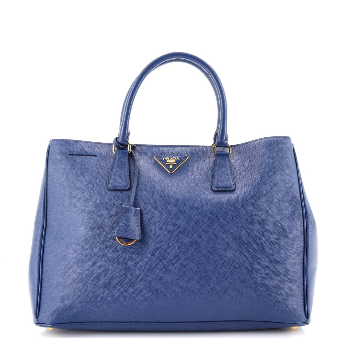 Saffiano leather North South open tote by Prada Lux: Saffiano leather North South open tote by Prada Lux Saffiano leather North South open tote by Prada Lux features a blue exterior with heavy edge wear, scuffs, and minor creases. The interior is made