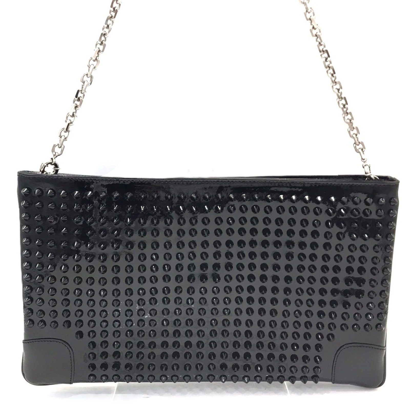 Louboutin Leather Christian Bag Shoulder: Louboutin Leather Christian Bag Shoulder Black leather shoulder bag with enamel details, measuring 18cm x 31.5cm and featuring a 61cm strap length, bearing a signature from Christian Louboutin. The ba
