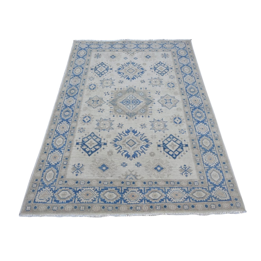 4'10"x6'7" Ivory Vintage Look Kazak Geometric Elements Wool Hand Knotted: 4'10"x6'7" Ivory Vintage Look Kazak Geometric Elements Wool Hand Knotted This stunning ivory vintage look Kazak rug boasts intricate geometric elements hand-knotted in wool, creating a unique and