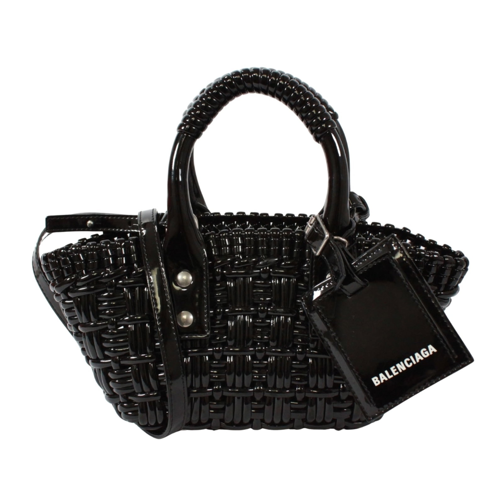 Basket Handbag Leather: Basket Handbag Leather Basket Handbag Leather in Black. This Balenciaga leather basket handbag features enamel details and measures 12cm x 28cm x 8cm. With a few traces of usage, it remains in very