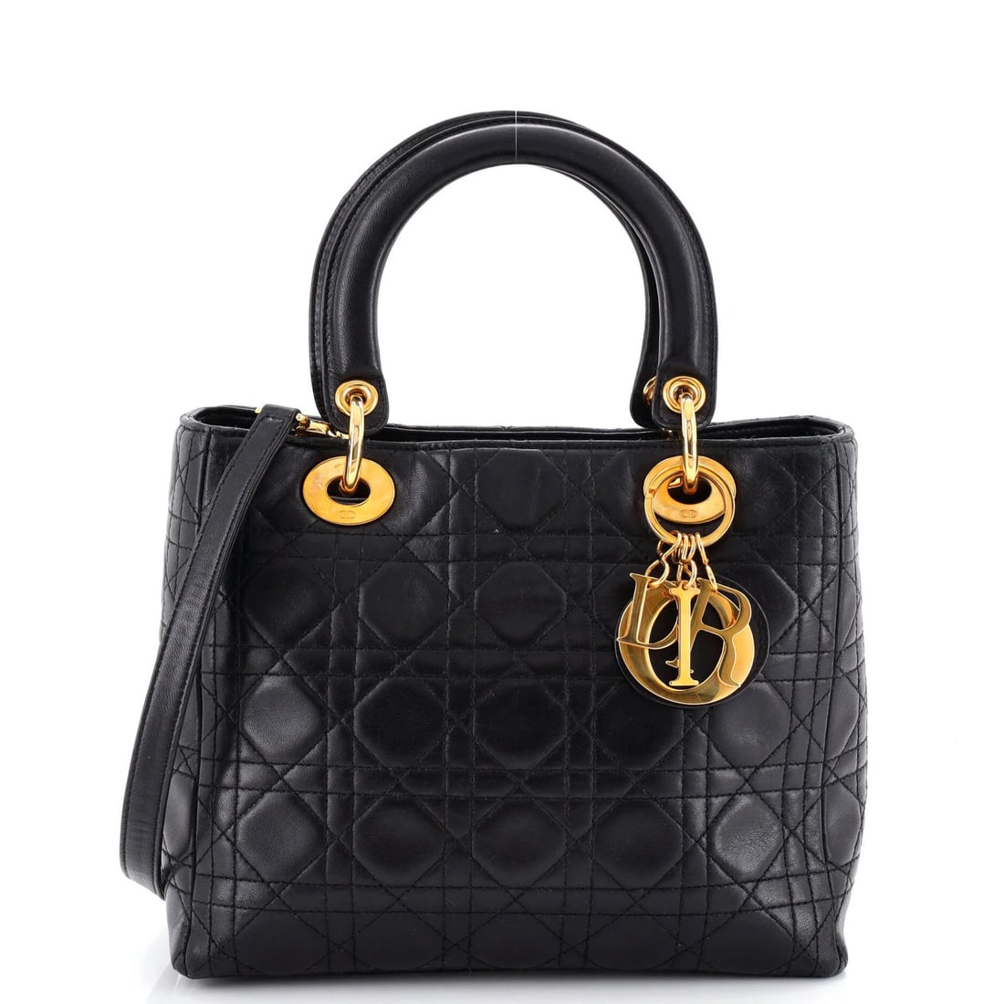 Christian Dior Lady Dior Quilt Medium Cannage Lambskin Bag Vintage: Christian Dior Lady Dior Quilt Medium Cannage Lambskin Bag Vintage Black leather Lady Dior Quilt Medium Cannage bag with gold hardware, featuring a medium size and red interior. This vintage bag