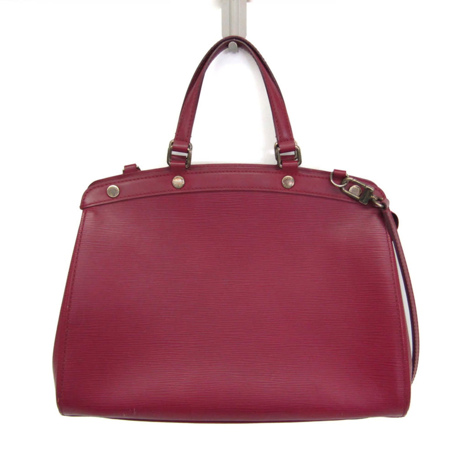 Epi Leather Handbag Shoulder Louis Vuitton: Epi Leather Handbag Shoulder Louis Vuitton Epi Leather Handbag Shoulder Louis Vuitton features a vibrant fuchsia color and sleek silver hardware, making it a stylish addition to any outfit. With an