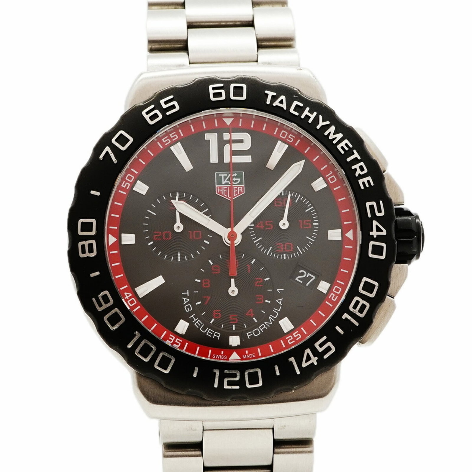 Wristwatch by Heuer: Wristwatch by Heuer Stainless steel band and black case make for a sleek, timeless design. The 42mm diameter and 18cm wrist size accommodate a variety of wrists, while the used condition shows signs