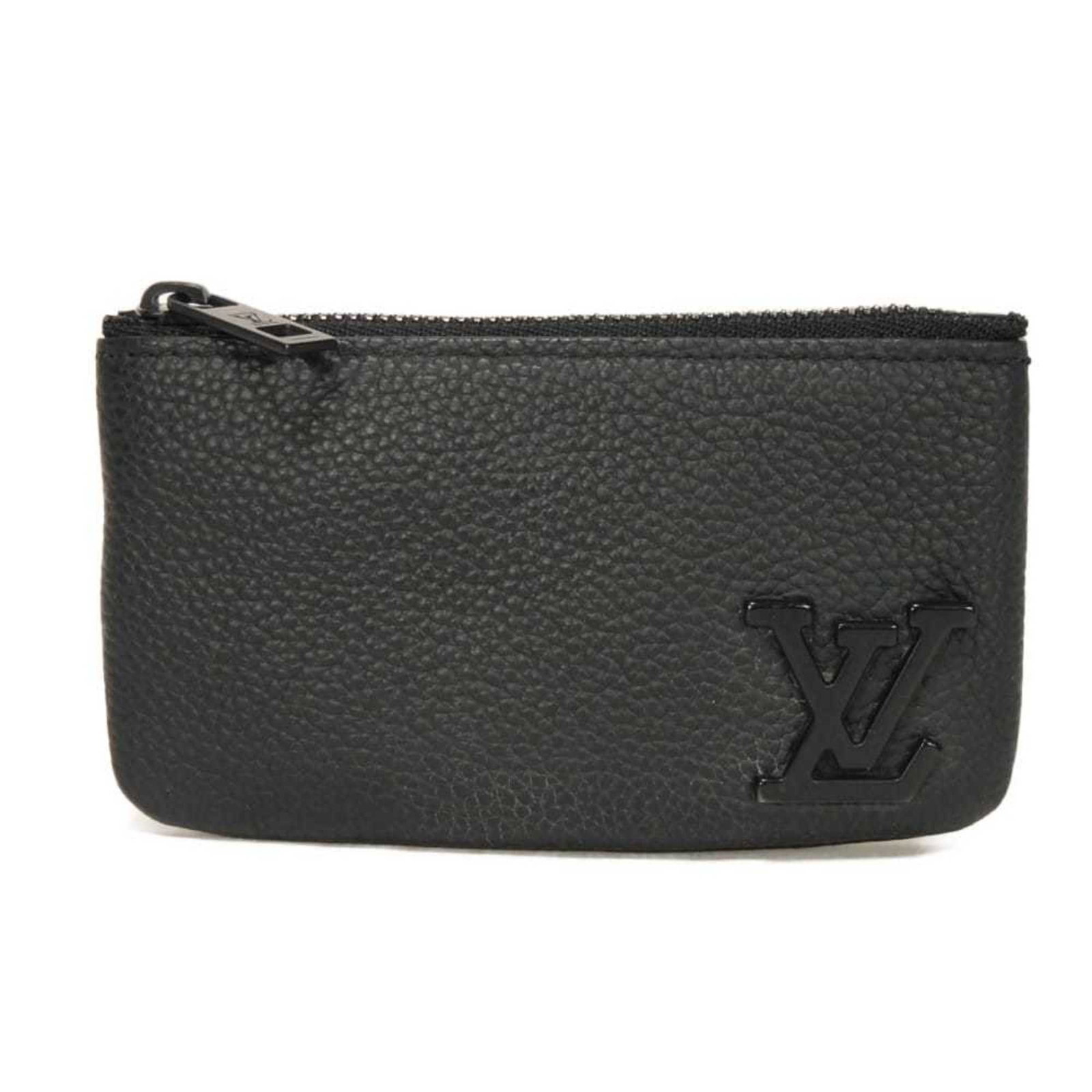 Louis Vuitton Coin Purse/ Coin Case Leather: Louis Vuitton Coin Purse/ Coin Case Leather The Louis Vuitton Coin Purse features embossed leather, grain cowhide leather construction, and a classic Noir color. Measuring 6.5cm x 11.5cm x 1.5cm, it